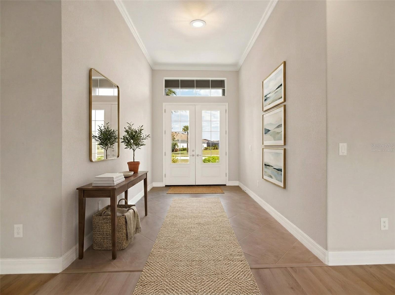 Ai Virtually staged foyer. - 14500 PONCE DE LEON TRL, PORT CHARLOTTE