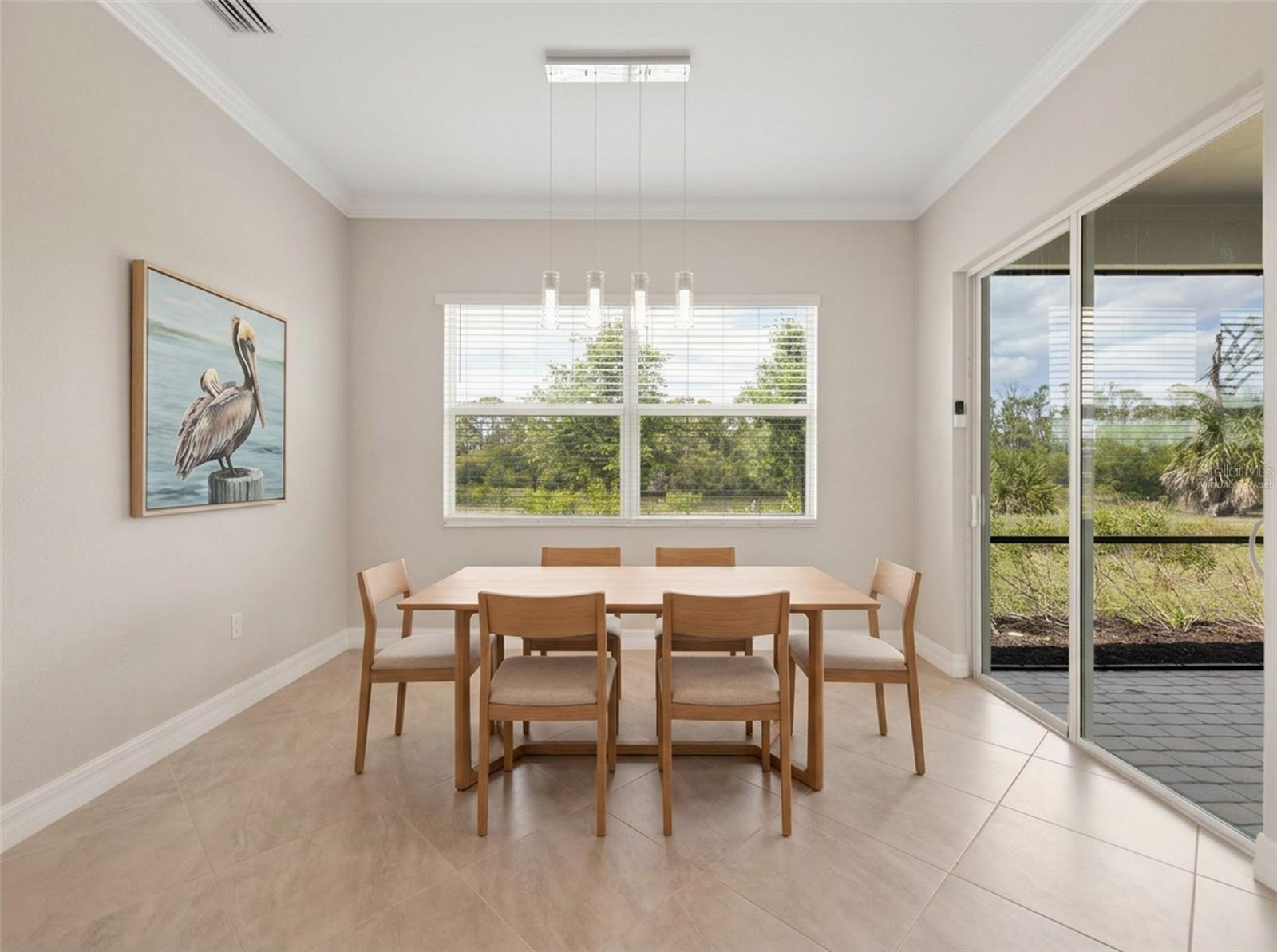 Ai Virtually staged dinging room. - 14500 PONCE DE LEON TRL, PORT CHARLOTTE