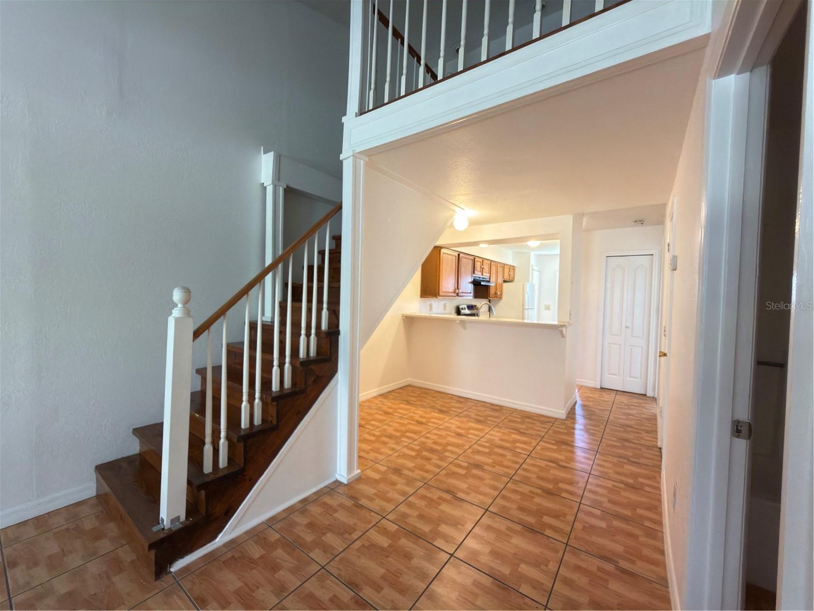 dining, kitchen, loft stairs - 3136 ENCLAVE CT, KISSIMMEE