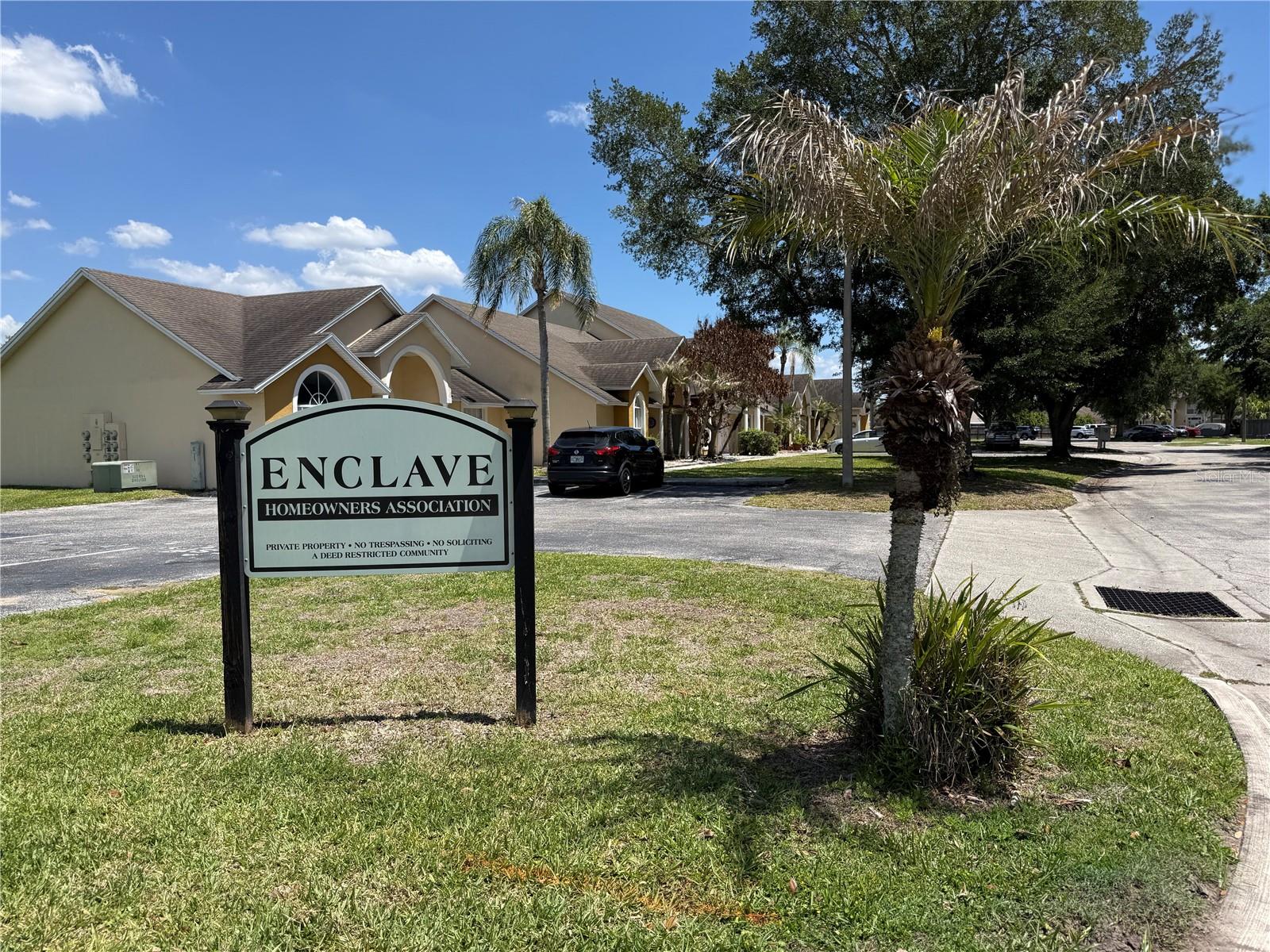 entrance signage - 3136 ENCLAVE CT, KISSIMMEE