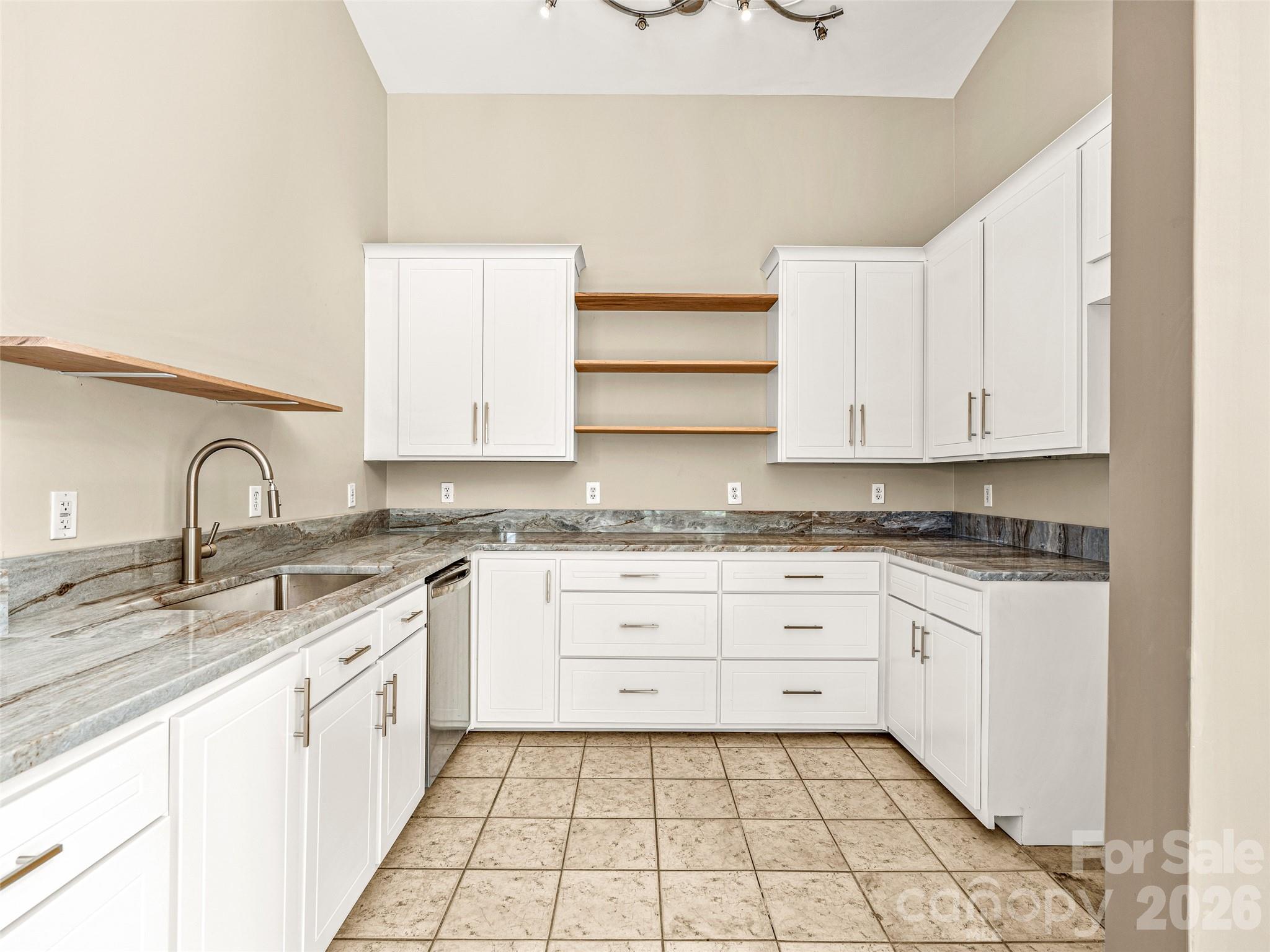 New kitchen cabinets and granite countertops. - 76 Raven Rock Lane, Marshall