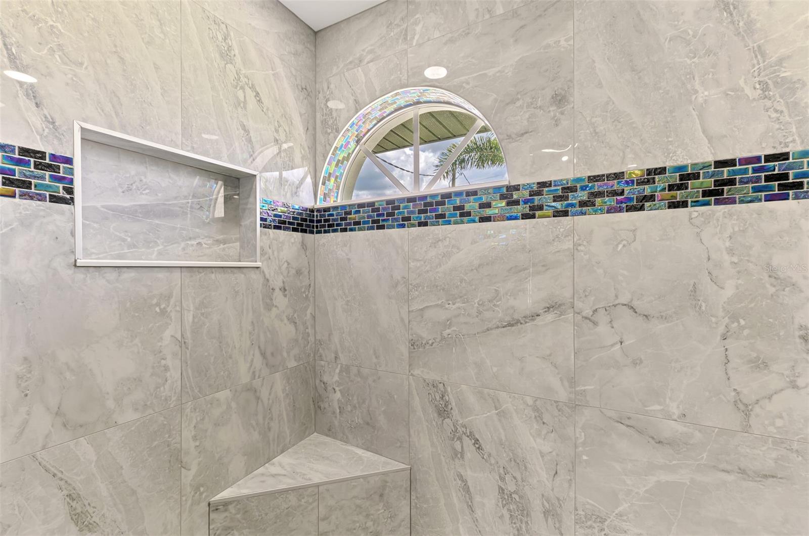 DUAL SHOWER HEAD PRIMARY SHOWER WITH BENCH - 3077 STONE ST, PORT CHARLOTTE