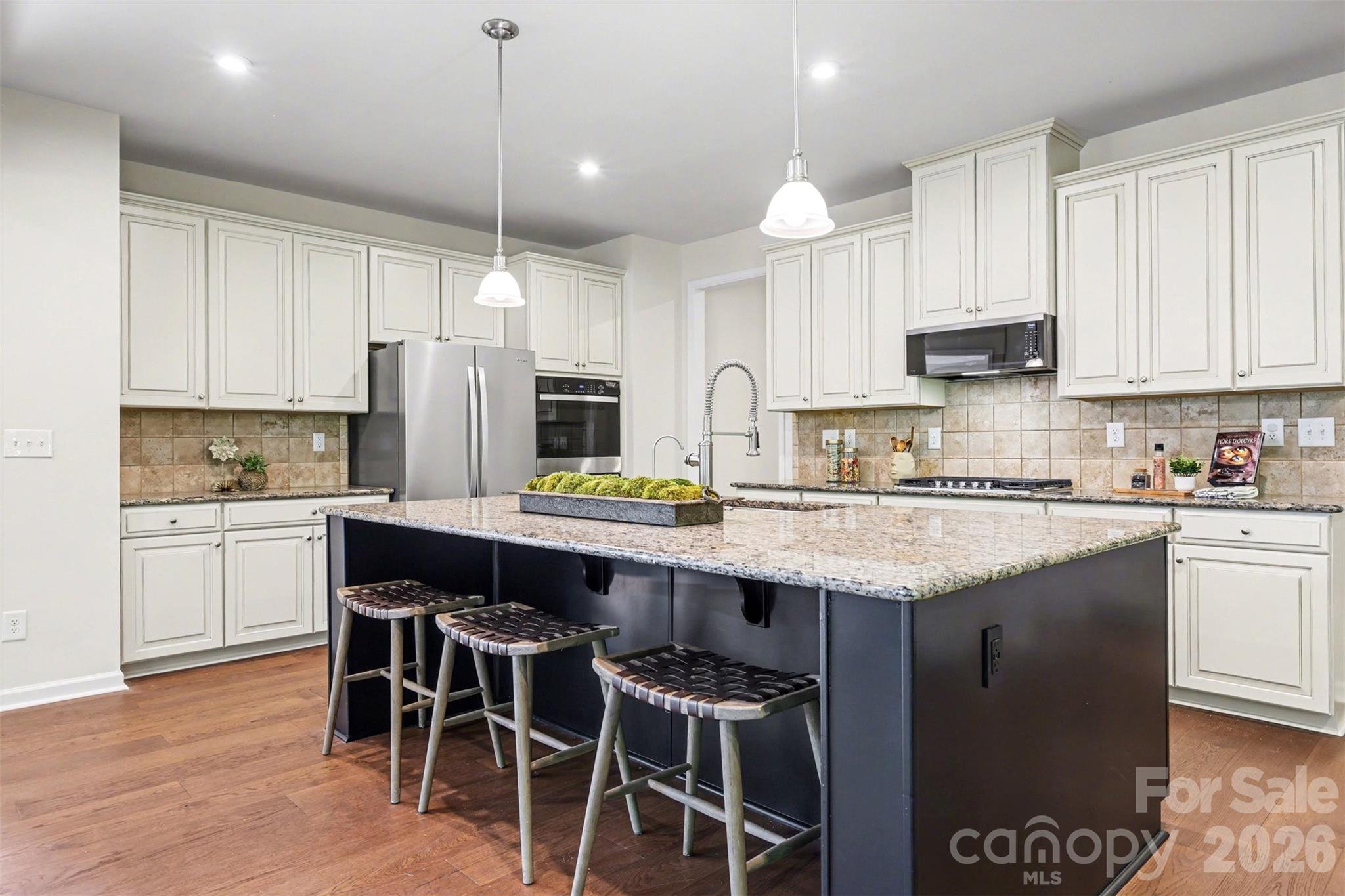 Another view of the kitchen island! - 824 Abbeywood Drive, Waxhaw