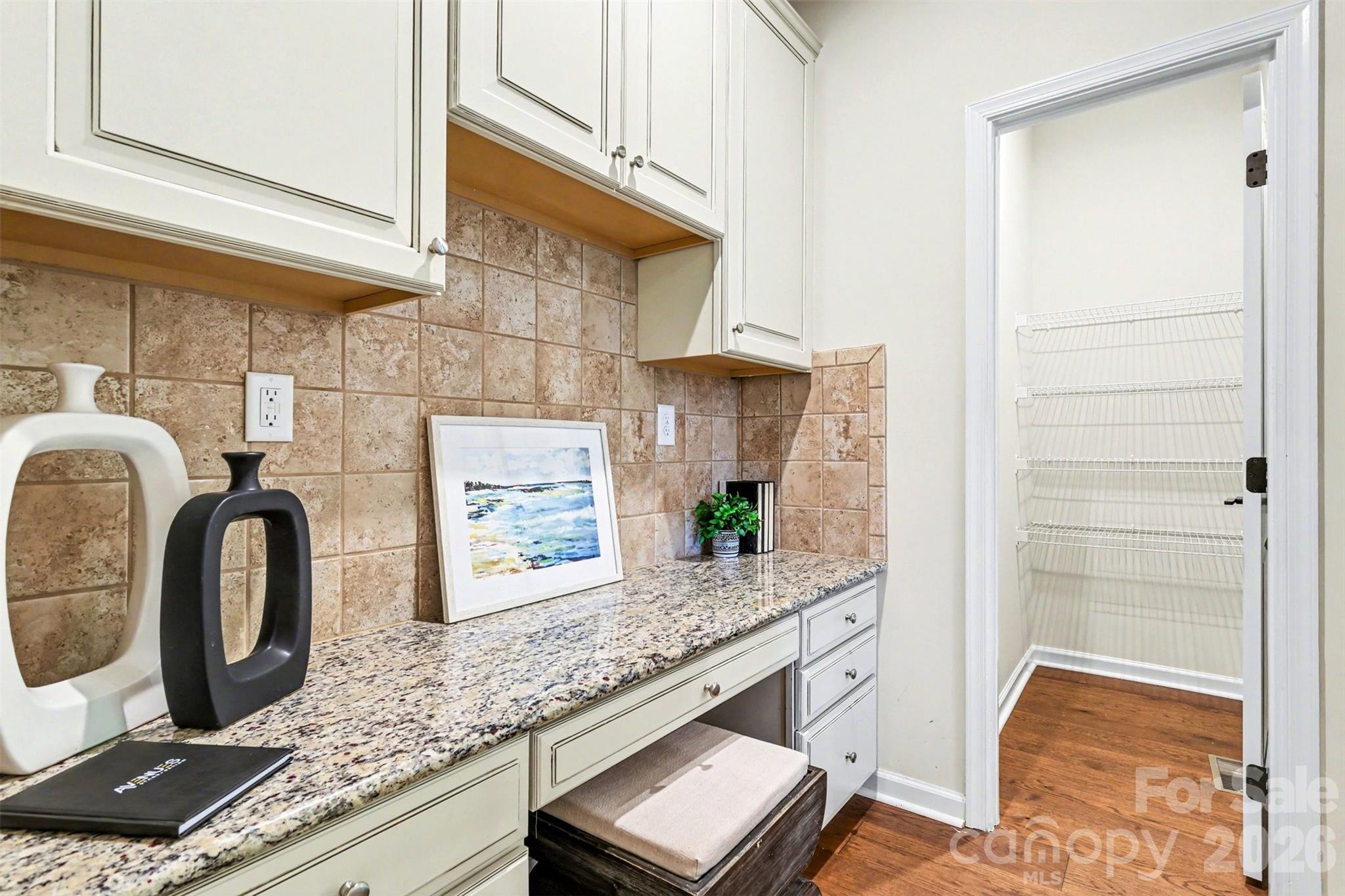 Tucked away work area adjacent to kitchen and walk-in pantry. - 824 Abbeywood Drive, Waxhaw