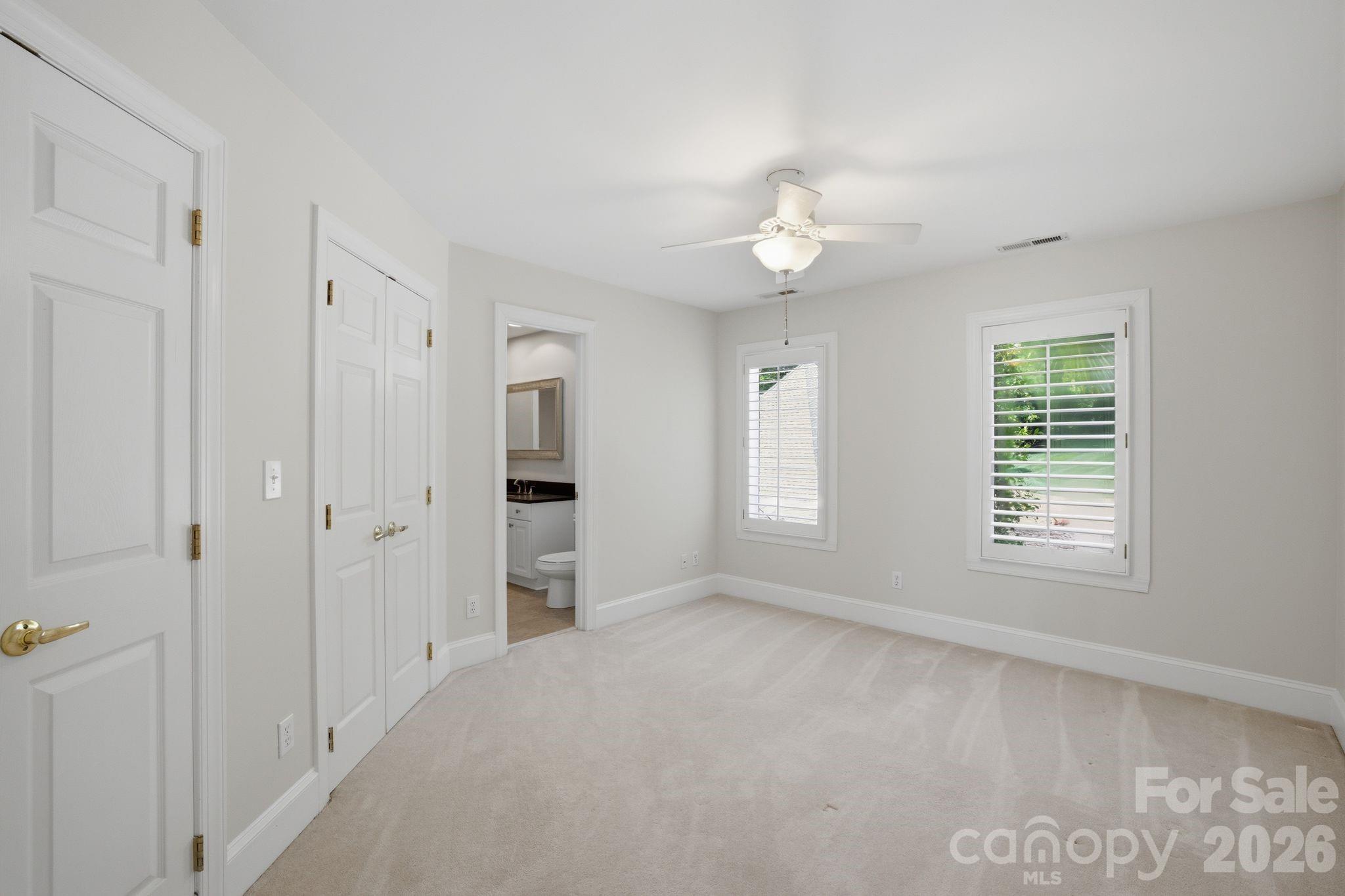 Upper level guest bedroom 1. - 144 Mariner Pointe Lane, Mooresville