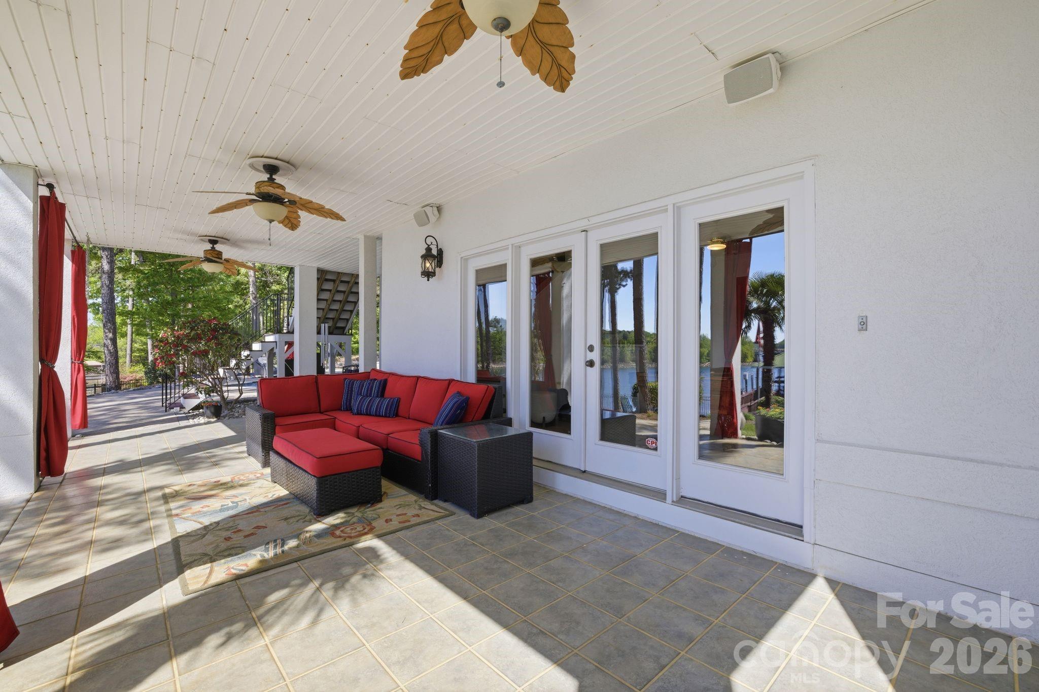 Lower level covered patio. - 144 Mariner Pointe Lane, Mooresville