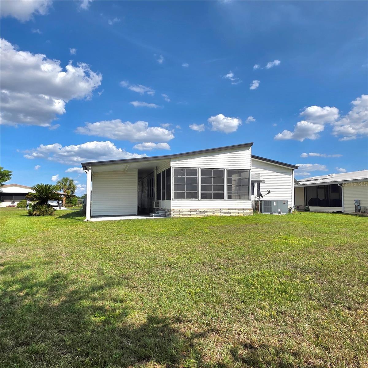 Rear View of the House - 6114 GRAND OAKS DR SE, WINTER HAVEN