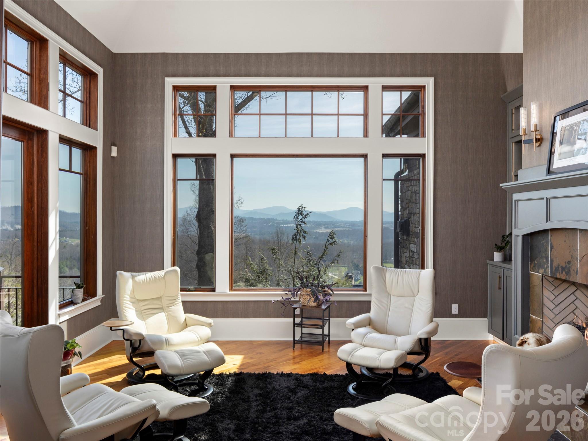 main level sitting room with long range views and door to upper deck - 47 Ridge Pine Trail, Arden