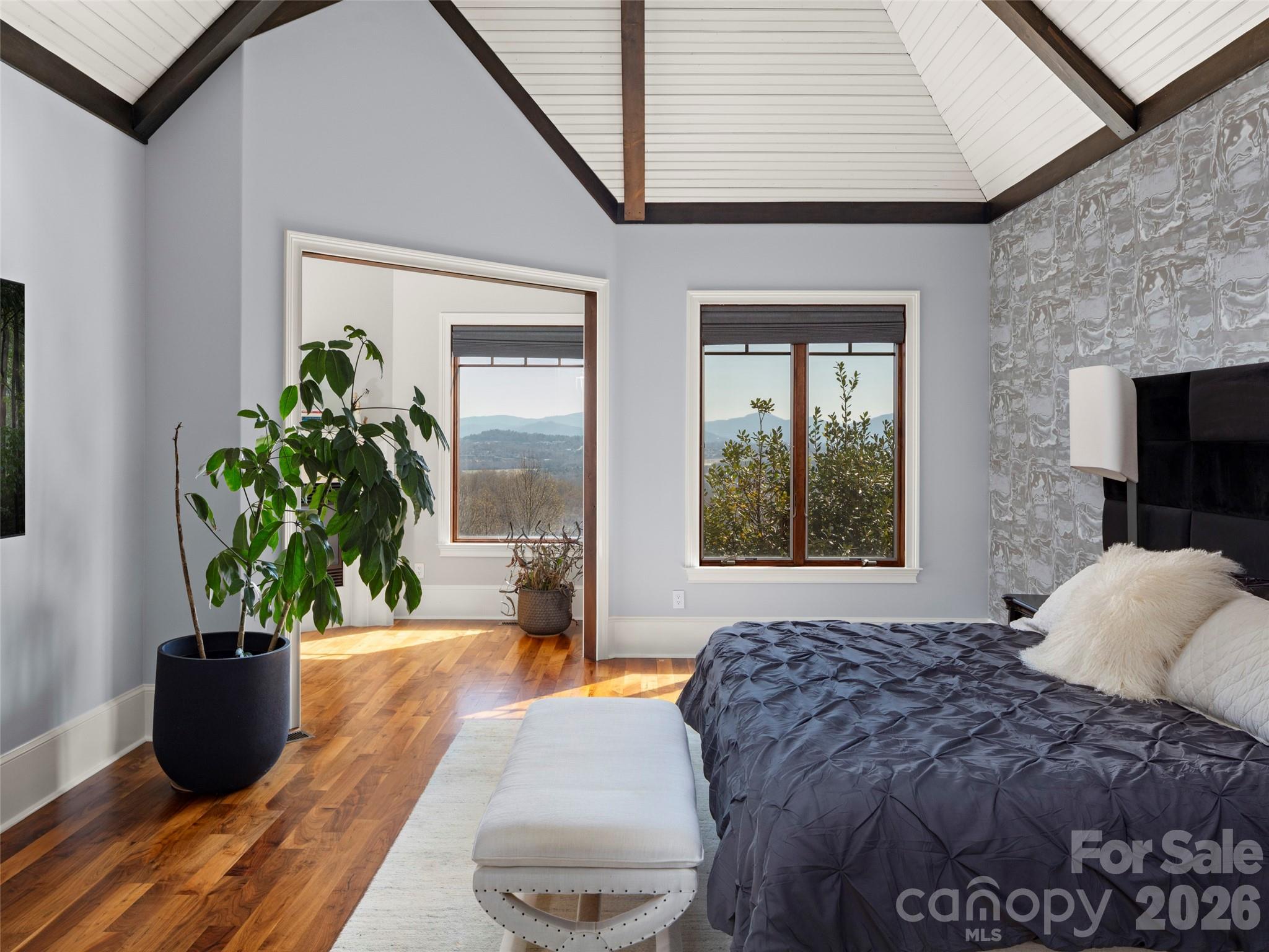primary bedroom looking towards the sitting room and fireplace - 47 Ridge Pine Trail, Arden