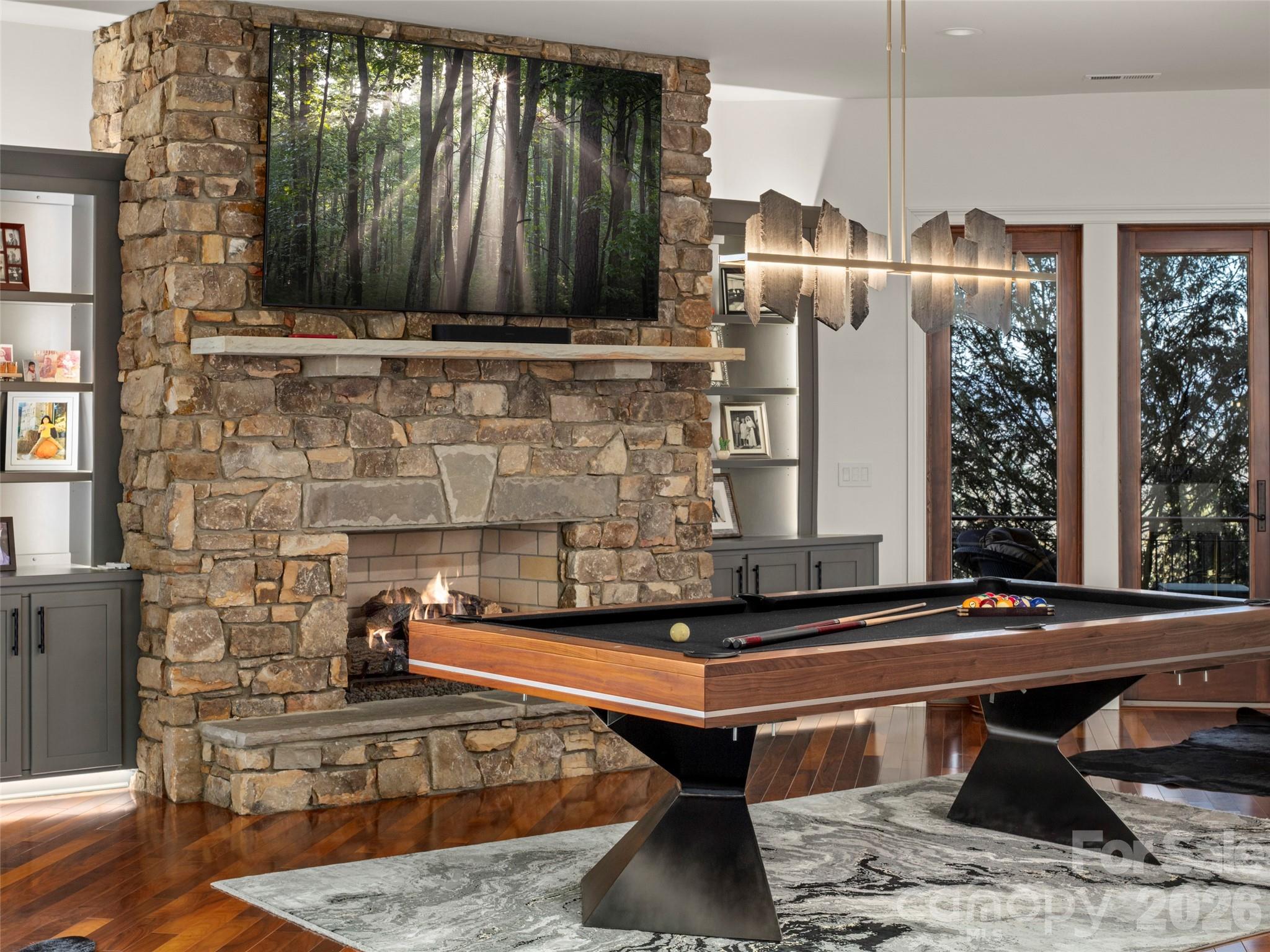 entertainment area pool table and fireplace - 47 Ridge Pine Trail, Arden