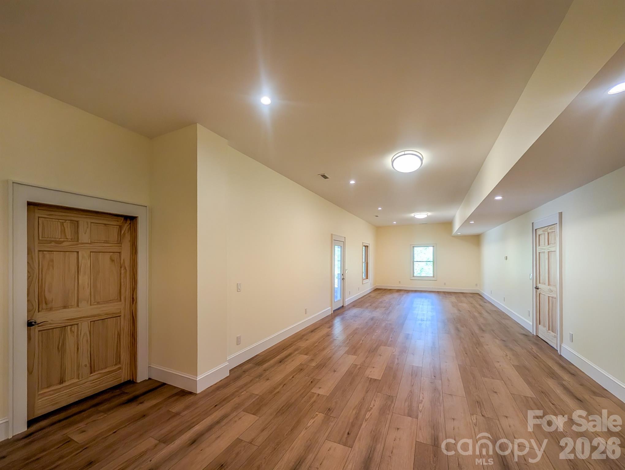 Fully Finished Downstairs offers flexible spacious room that would be ideal for Media, Recreation & More! Includes Outdoor Access, Under the Stairs Storage, Spacious Bedroom with private en-suite bathroom & More - 338 Majestic Mountain Drive, Burnsville