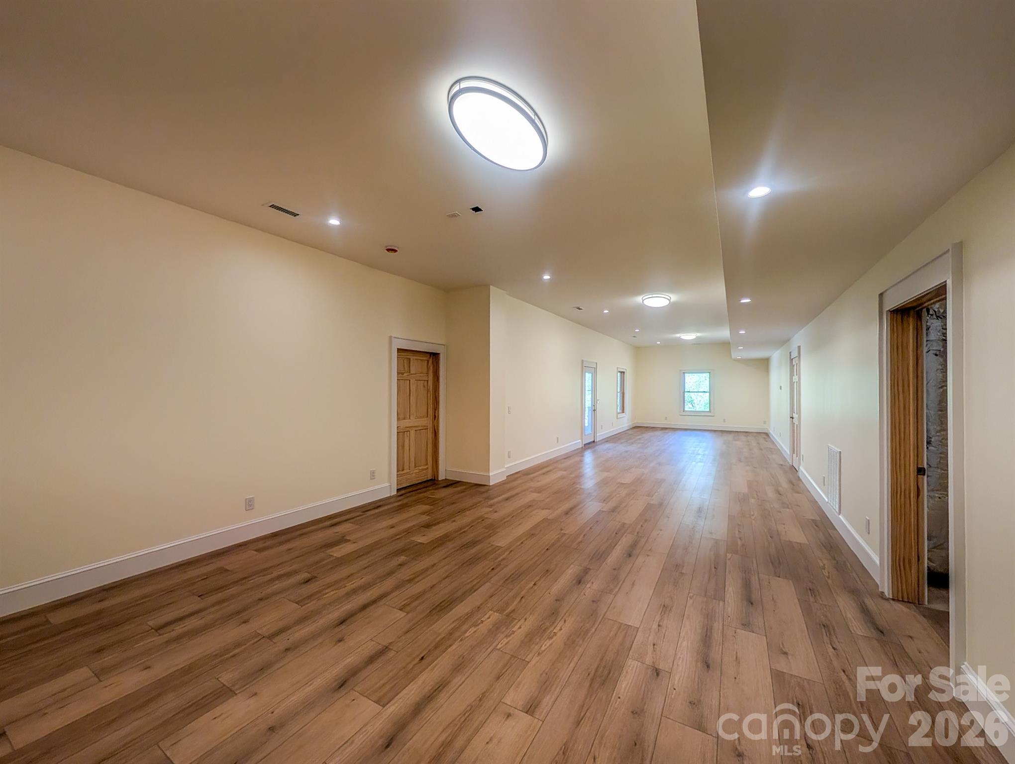 Fully Finished Downstairs offers flexible spacious room that would be ideal for Media, Recreation & More! Includes Outdoor Access, Under the Stairs Storage, Spacious Bedroom with private en-suite bathroom & More - 338 Majestic Mountain Drive, Burnsville