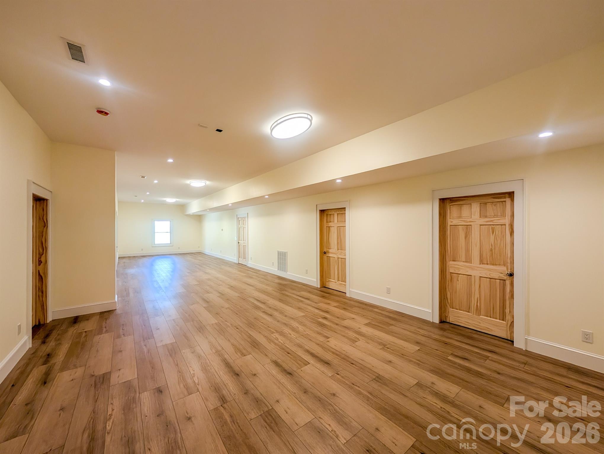 Fully Finished Downstairs offers flexible spacious room that would be ideal for Media, Recreation & More! Includes Outdoor Access, Under the Stairs Storage, Spacious Bedroom with private en-suite bathroom & More - 338 Majestic Mountain Drive, Burnsville