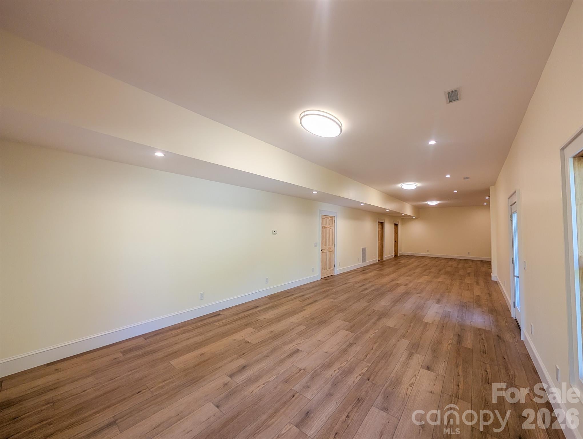 Fully Finished Downstairs offers flexible spacious room that would be ideal for Media, Recreation & More! Includes Outdoor Access, Under the Stairs Storage, Spacious Bedroom with private en-suite bathroom & More - 338 Majestic Mountain Drive, Burnsville