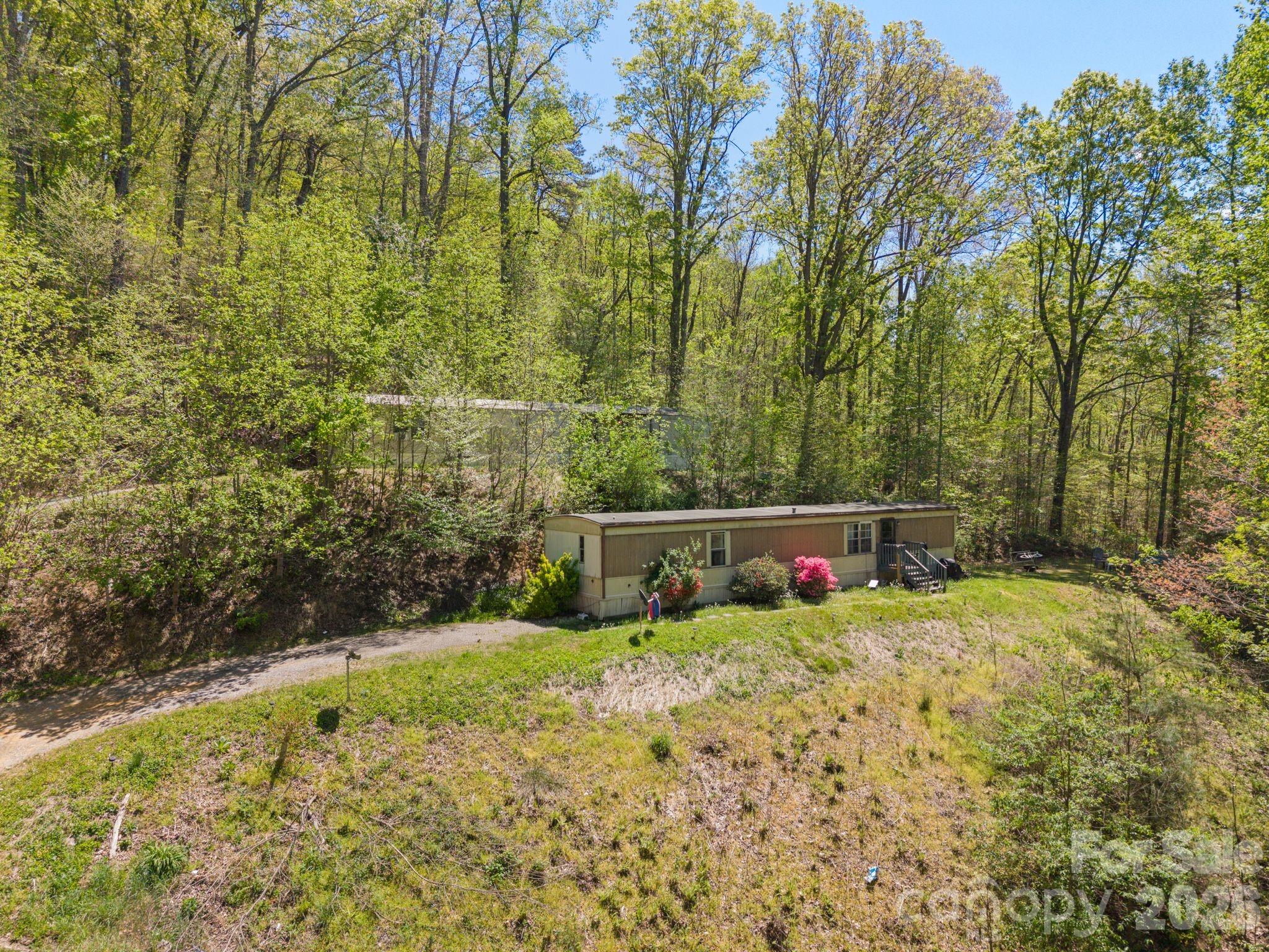 Upper units on right side of driveway. Long term tenants in place - 290 Hookers Gap Road, Candler