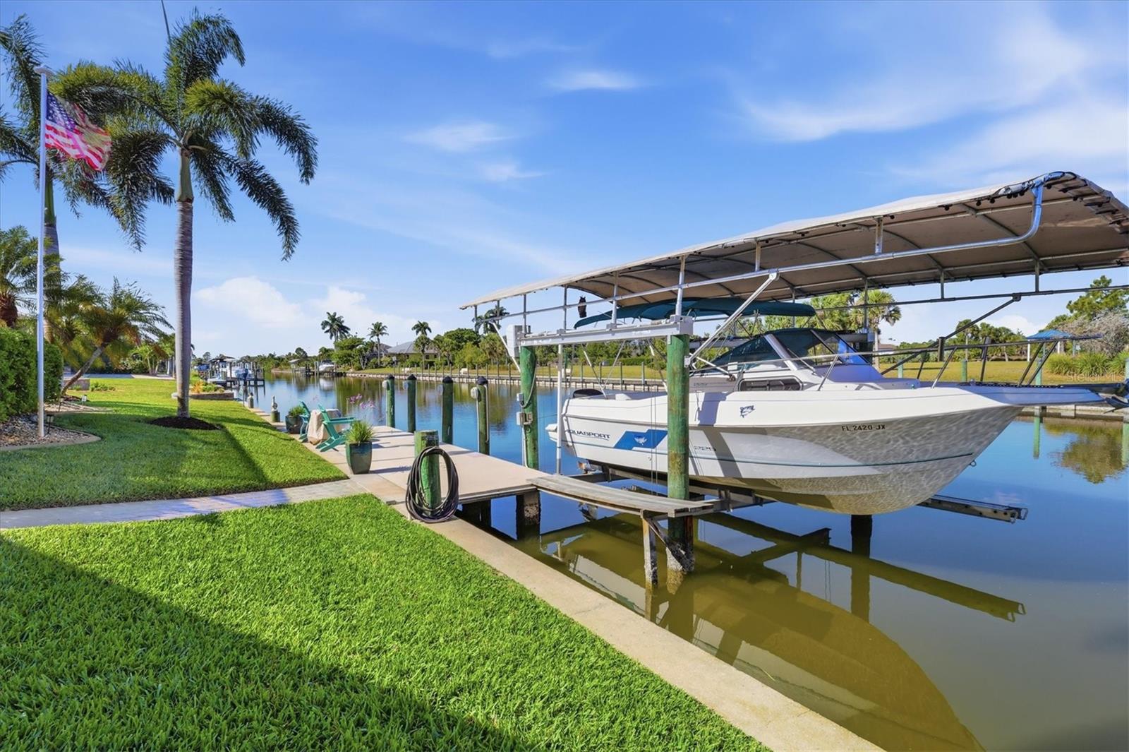 10000lb boat lift with 29' canopy, Boat will convey - 8050 TRACY CIR, PORT CHARLOTTE
