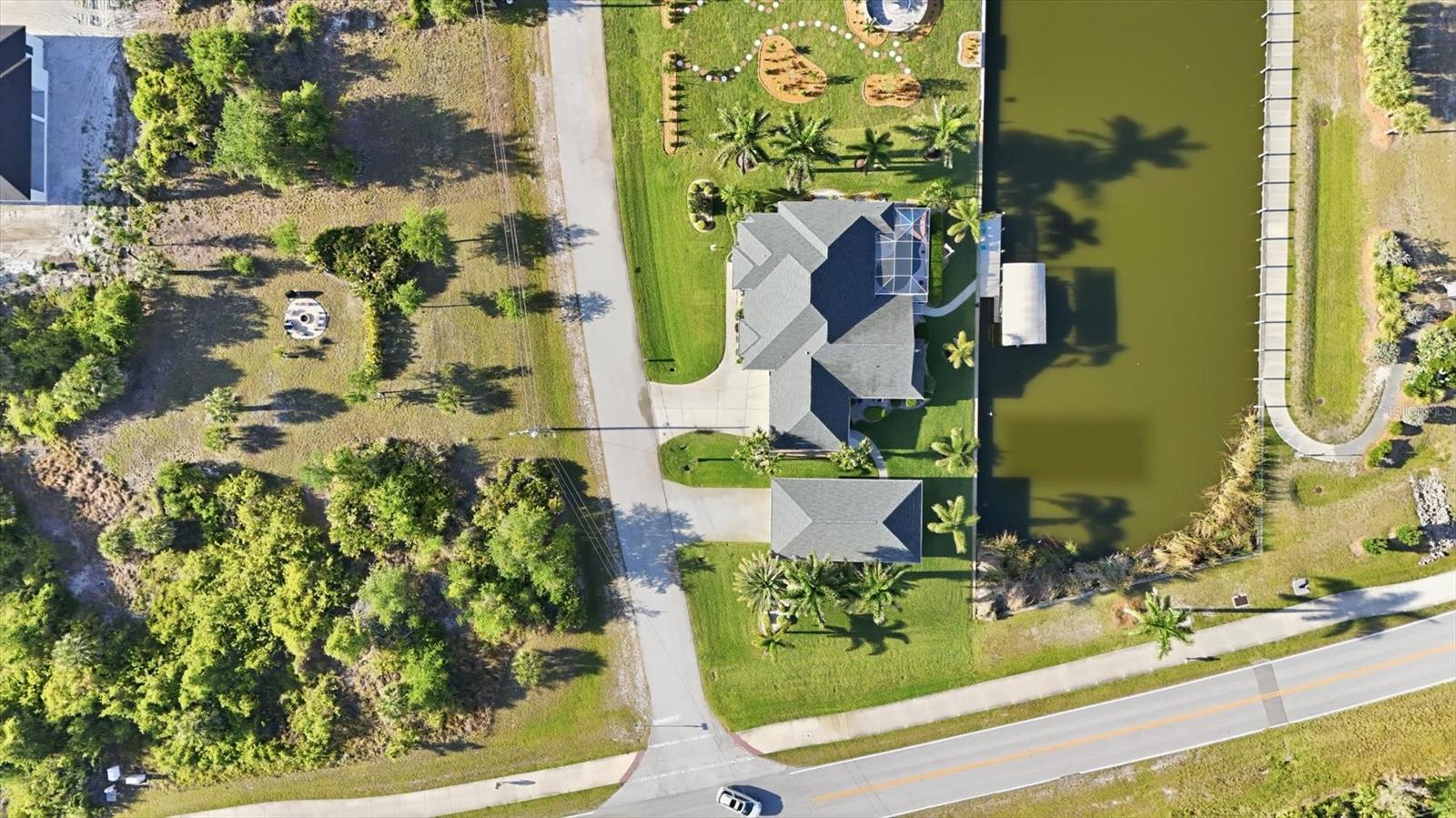 Amazing property with the Lot across the street is 153x85x140 complete with fire pit area - 8050 TRACY CIR, PORT CHARLOTTE