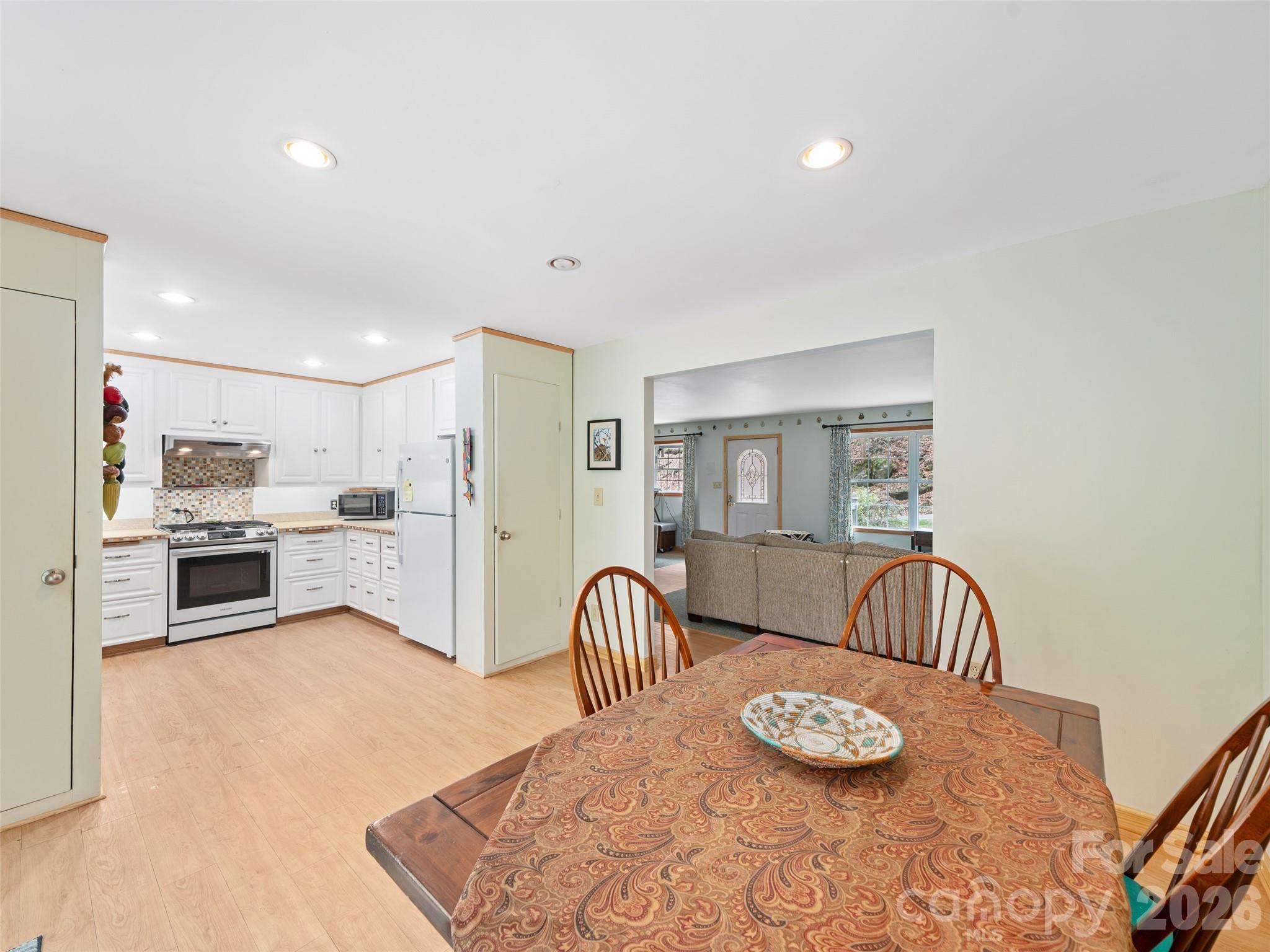 open kitchen and dining - 3829 Coxes Creek Road, Burnsville