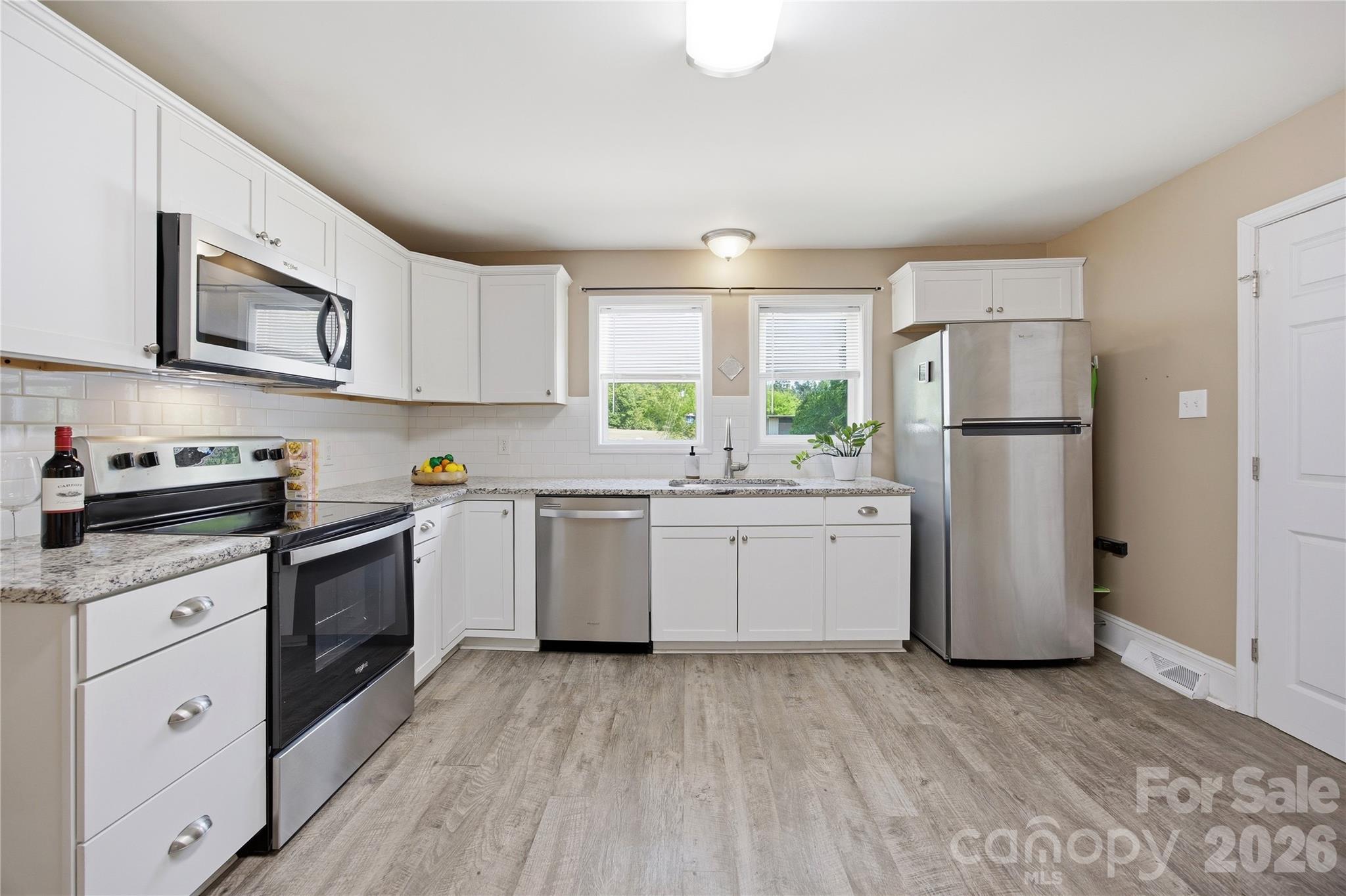 Kitchen with Granite and Stainless Steel Appliances - 1108 Skyland Street, Kannapolis