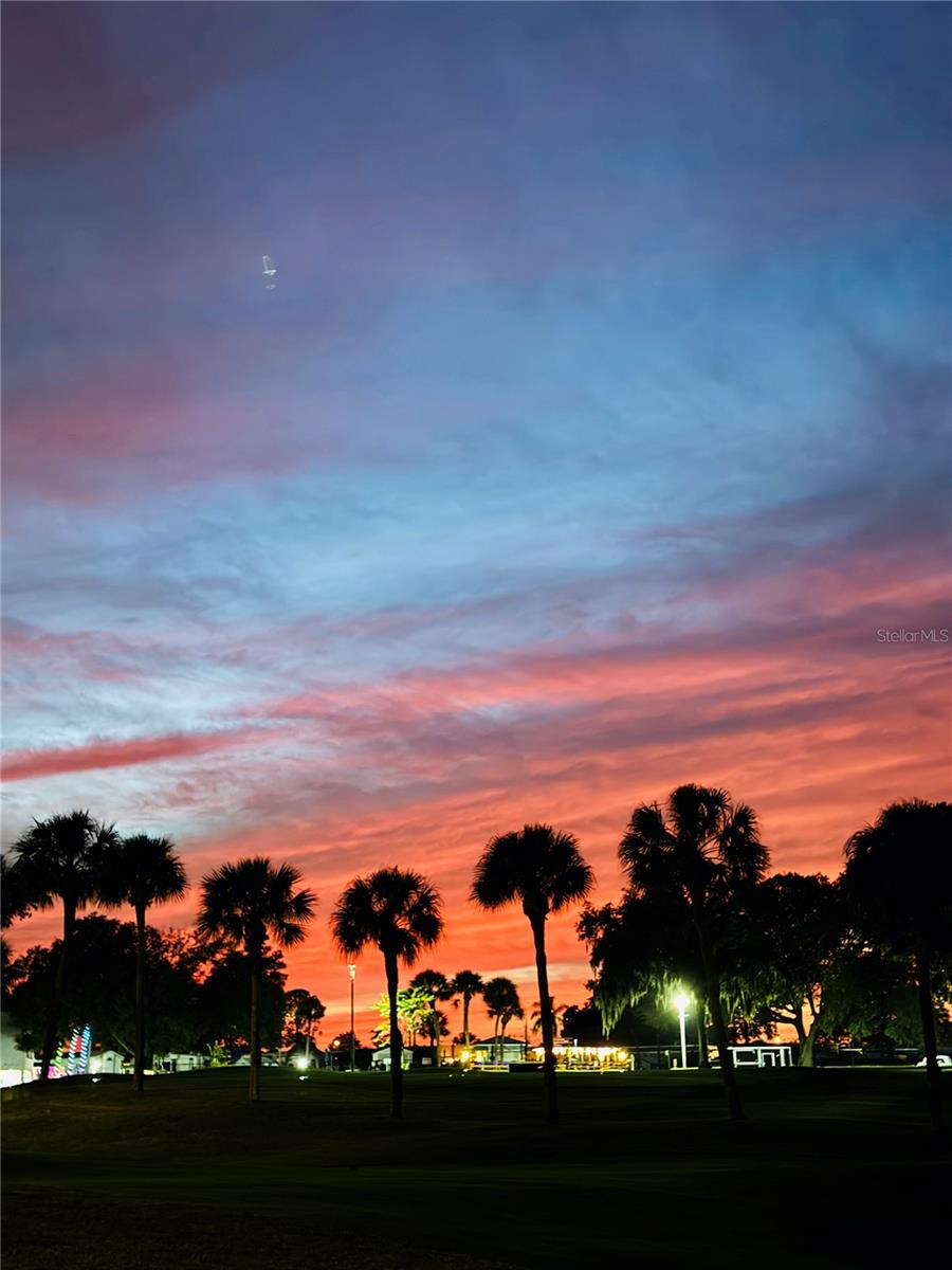 Beautiful skies over the main clubhousse - 917 ST GEORGE DR, DAVENPORT
