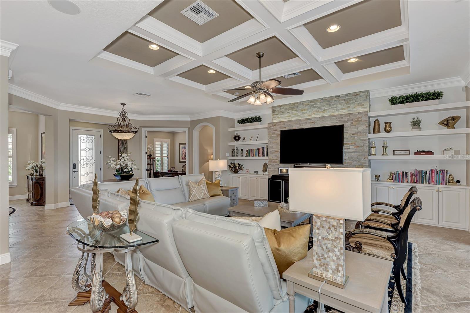 Hand designed and built beamed ceiling- master crafted by Fine-Line Carpentry - High end custom lighting and fans throughout the home. - 10965 BULLRUSH DR, VENICE