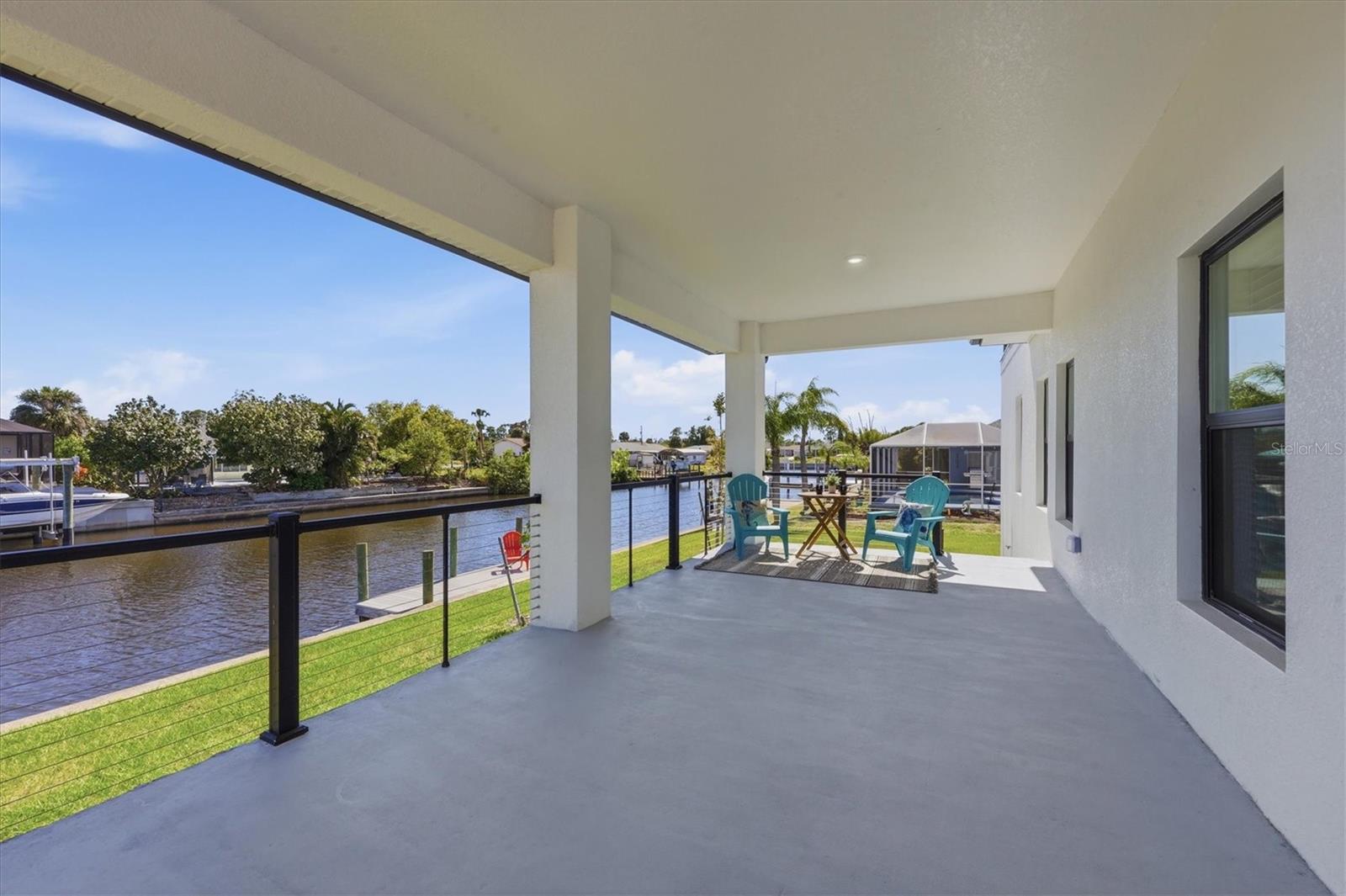 First floor balcony with steps to access your dock - 12387 MINOT AVE, PORT CHARLOTTE