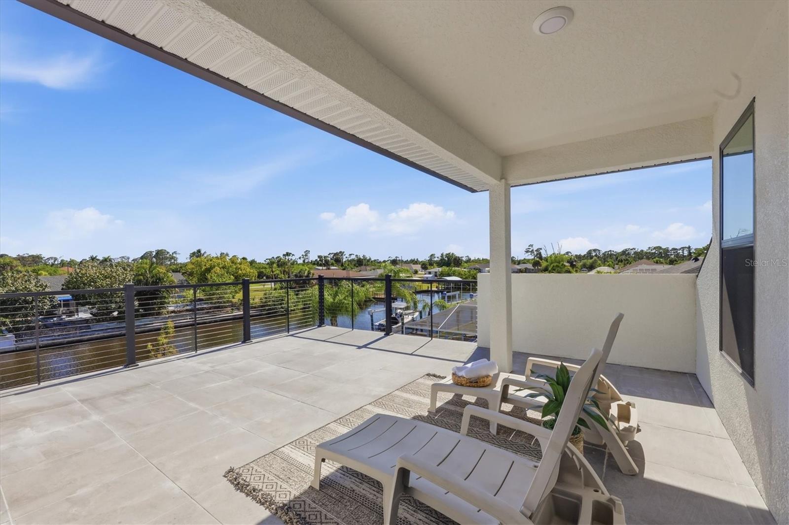 Second floor deck with great views of the Minot Waterway and out to the Myakka River - 12387 MINOT AVE, PORT CHARLOTTE
