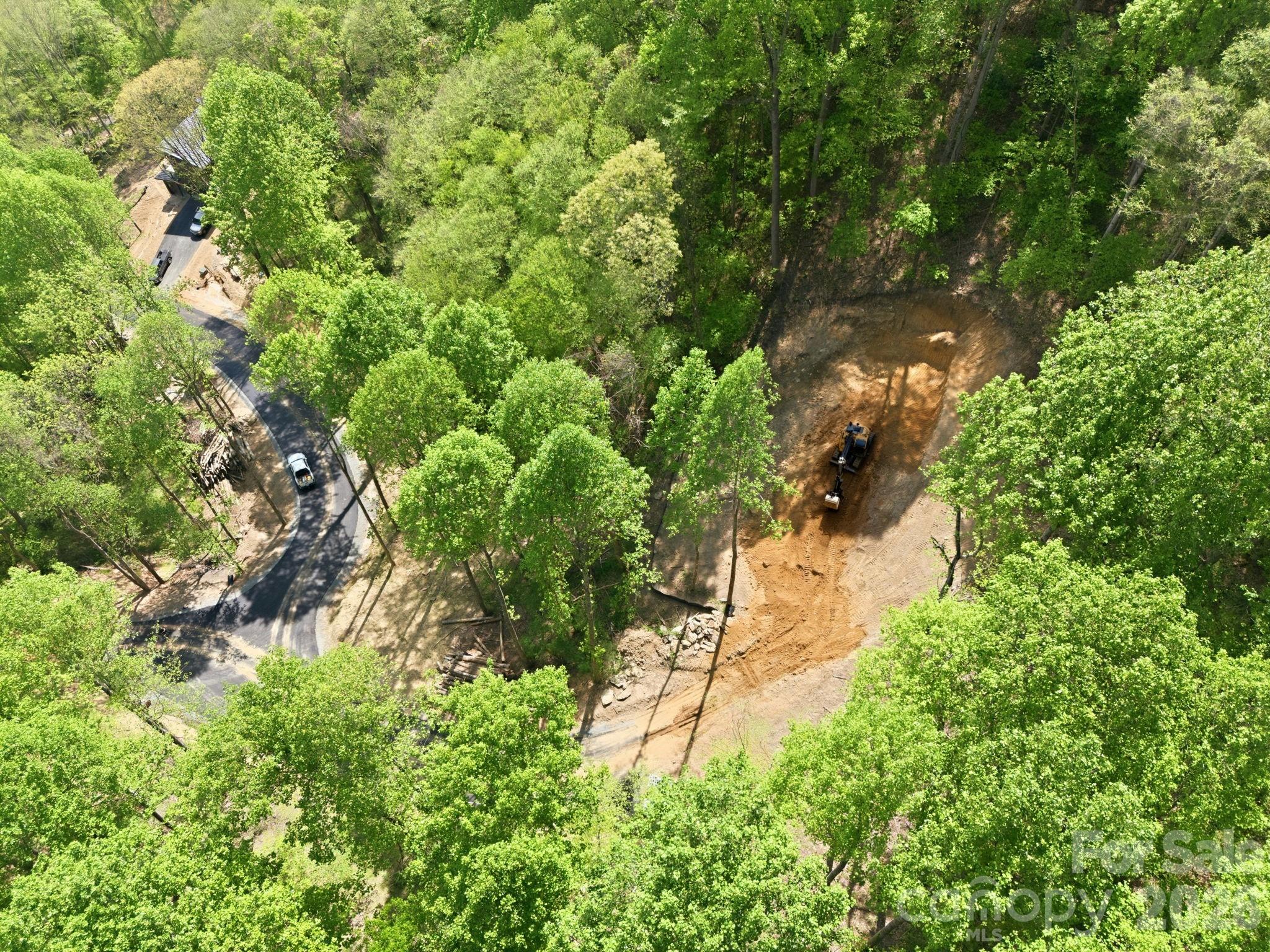 View from above. The next door neighbor is the little piece of home you see to the upper left of the photo. - 122 Running Deer Lane, Mars Hill