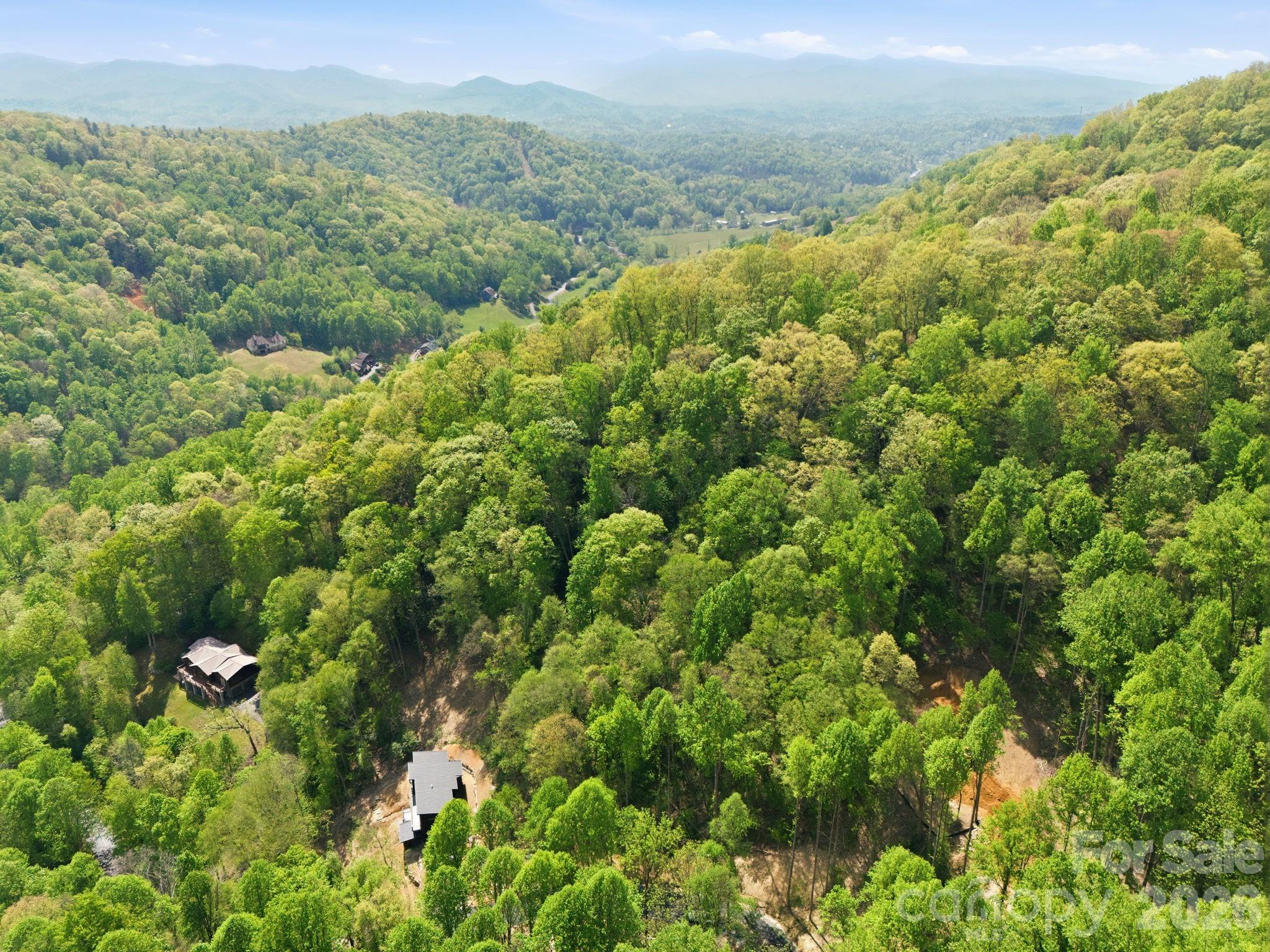 Lot is to the lower right of the photo where you see dirt. - 122 Running Deer Lane, Mars Hill