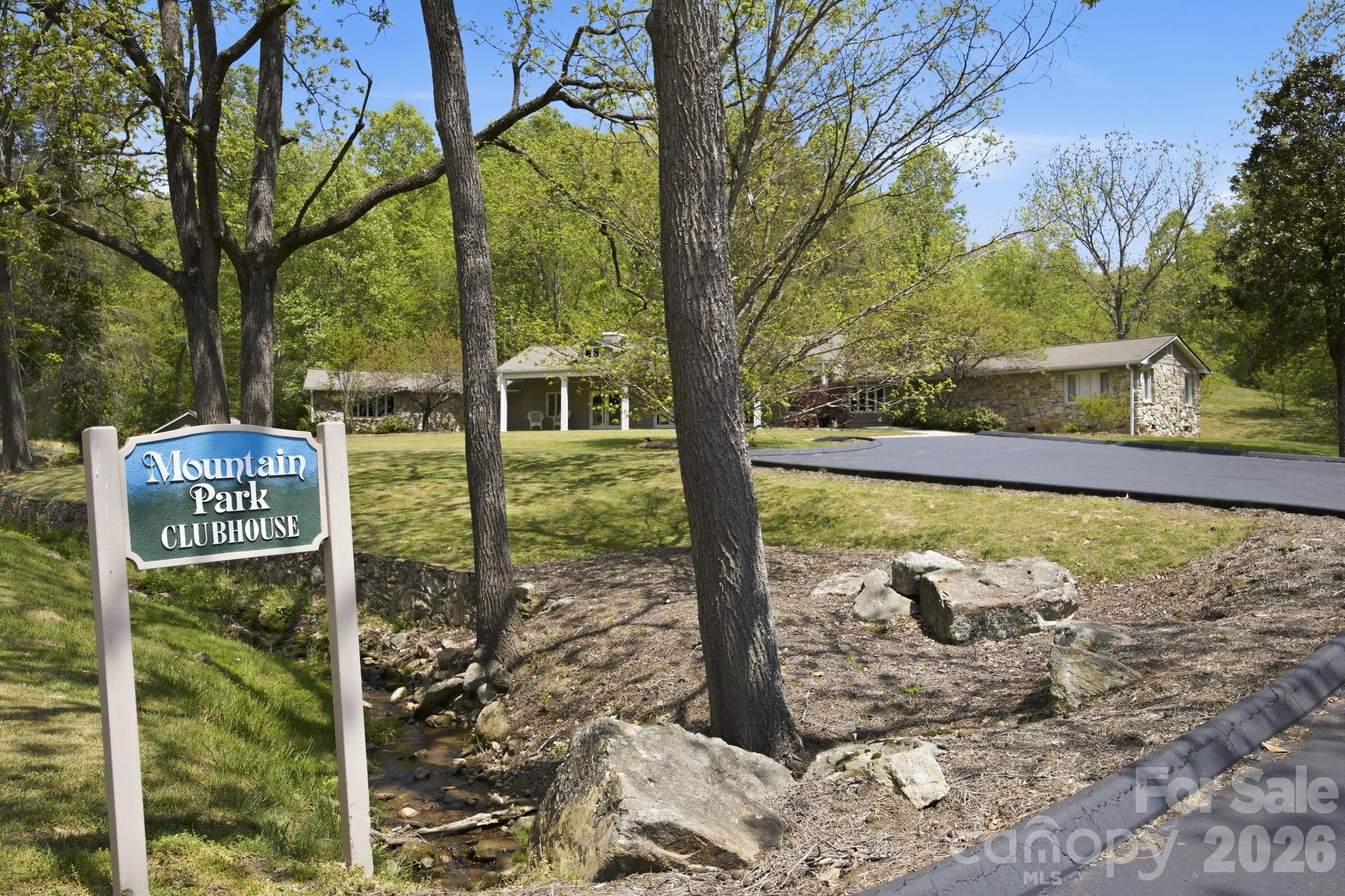 Community clubhouse nestled in the woods. - 122 Running Deer Lane, Mars Hill