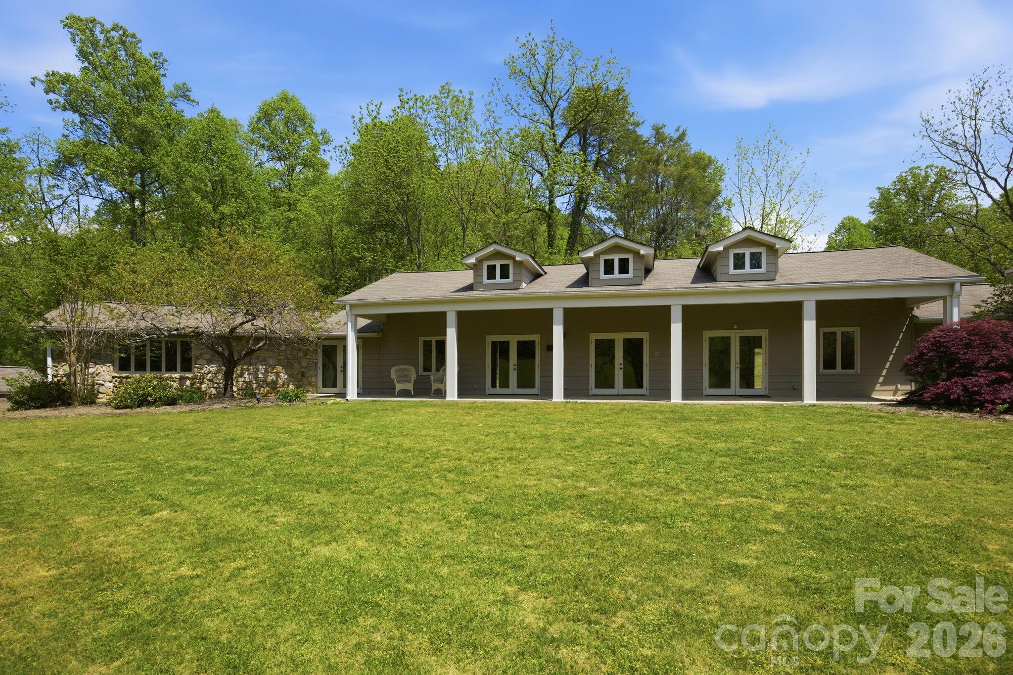 The back of the clubhouse. Host a larger gathering here. - 122 Running Deer Lane, Mars Hill