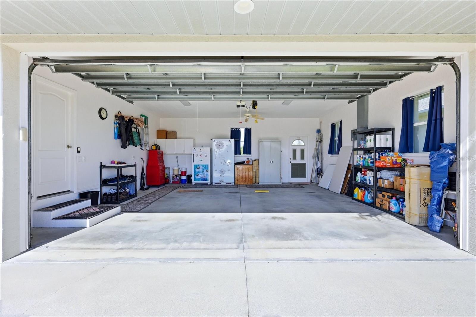 2 Car Garage - 8050 TRACY CIR, PORT CHARLOTTE