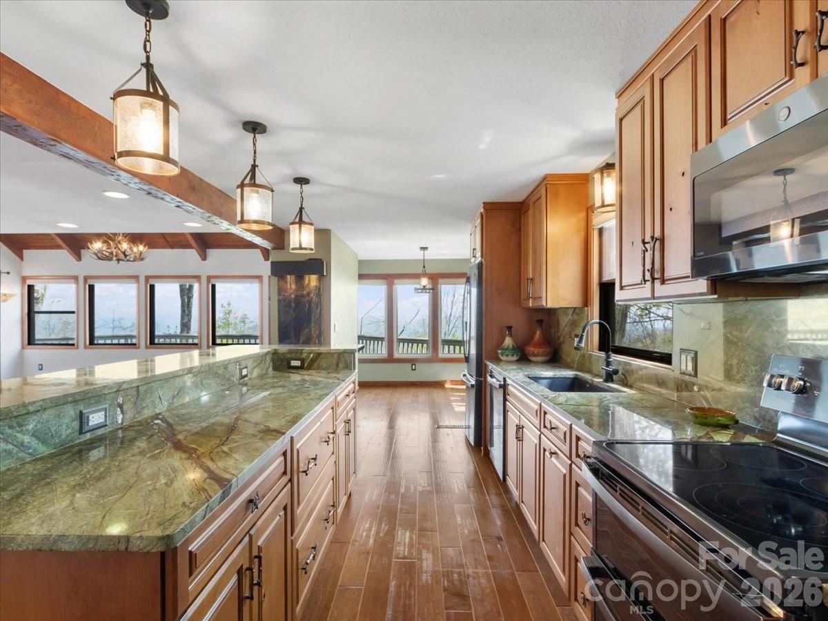 Kitchen with imported Marble countertops - 49 Slickrock Ridge Way S, Burnsville