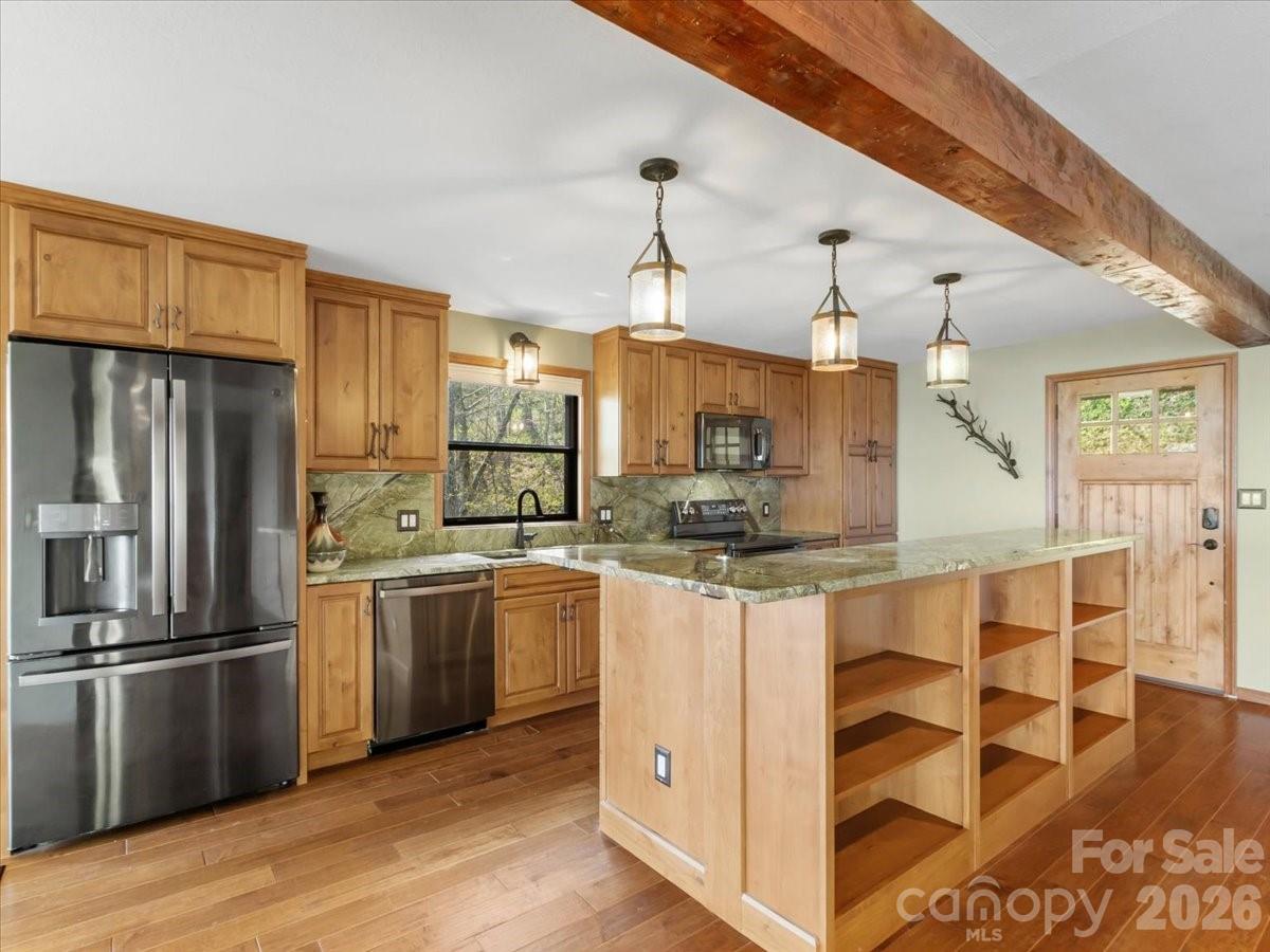 Kitchen island with built-ins - 49 Slickrock Ridge Way S, Burnsville