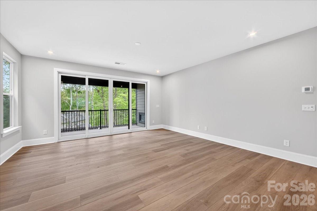 Large glass sliding doors to the outdoor living - 420 Old Town Village Road, Waxhaw