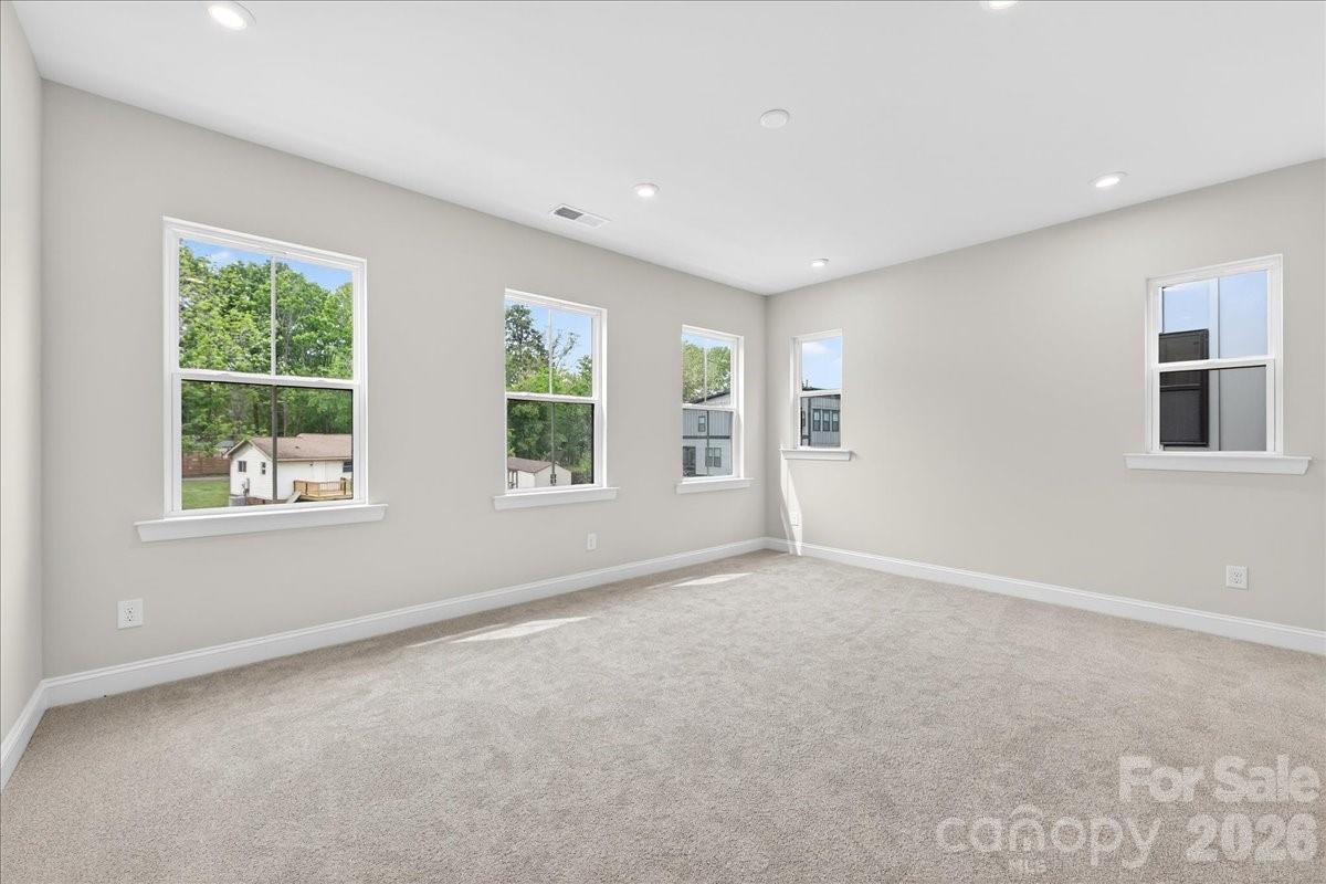 Light filled primary bedroom - 420 Old Town Village Road, Waxhaw