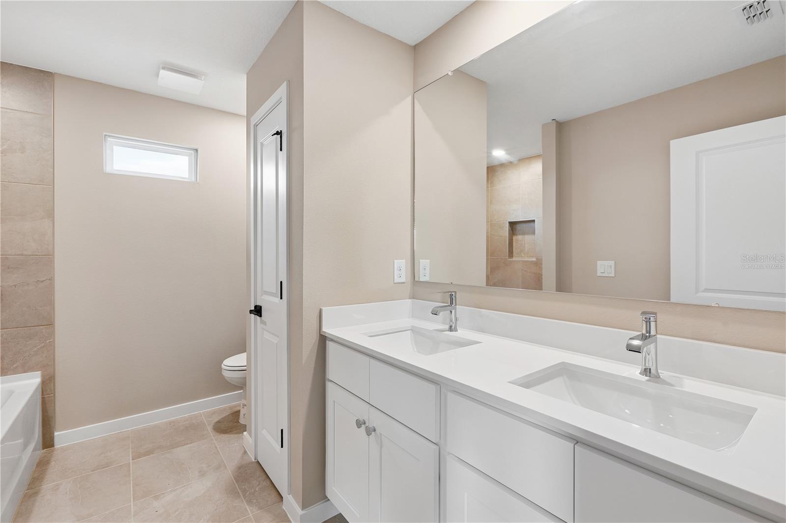 Images are of a similar model; actual home may vary - 90 SPRINGWOOD DR, PALM COAST