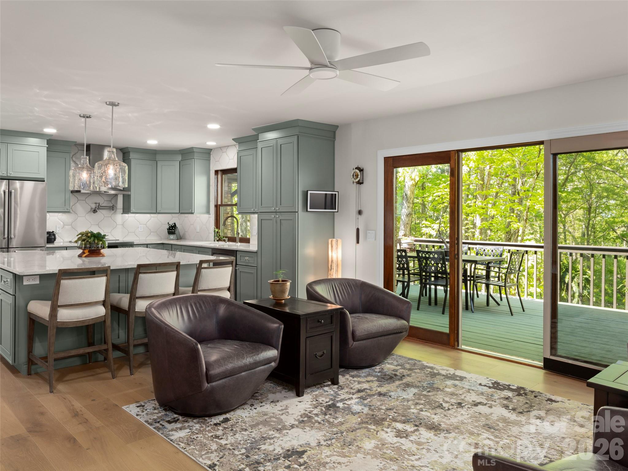 To where is your gaze drawn? The lush green canopy which opens in the winter to a marvelous winter-view sunset or the colossally useful center island? The security technology is guided by the goal of living at peace. - 152 Eastmoor Drive, Asheville