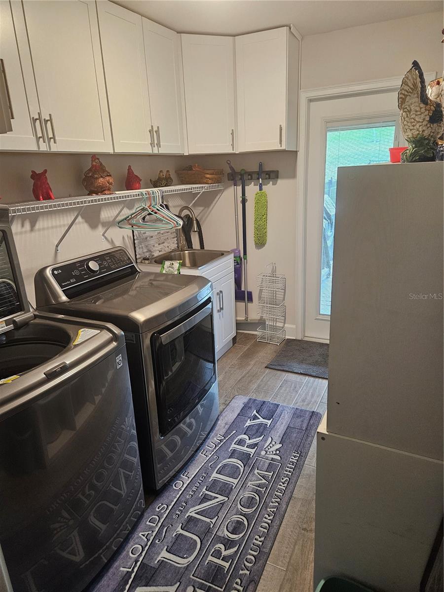 Laundry, washer/drier, and new wall cabinets - 4222 JULIANA LAKE DR, AUBURNDALE