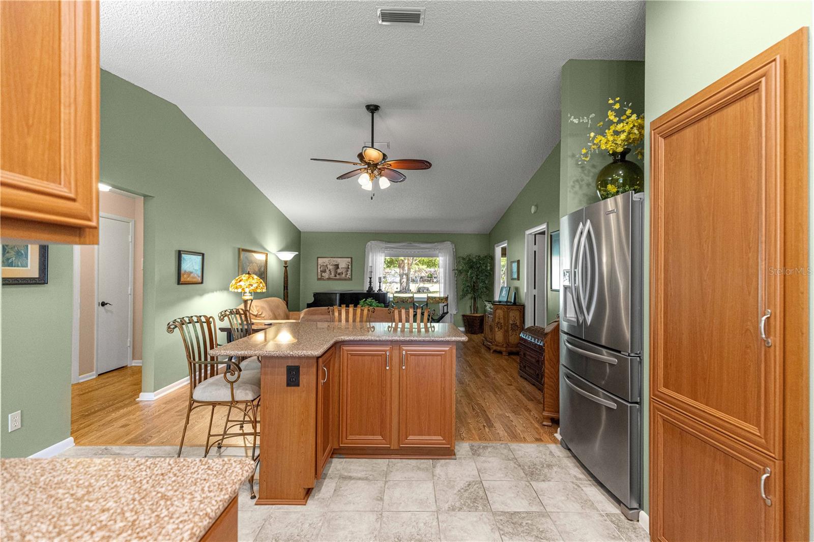 VIEW OF KITCHEN AND GREAT ROOM - 9380 SW 84TH TER #C, OCALA