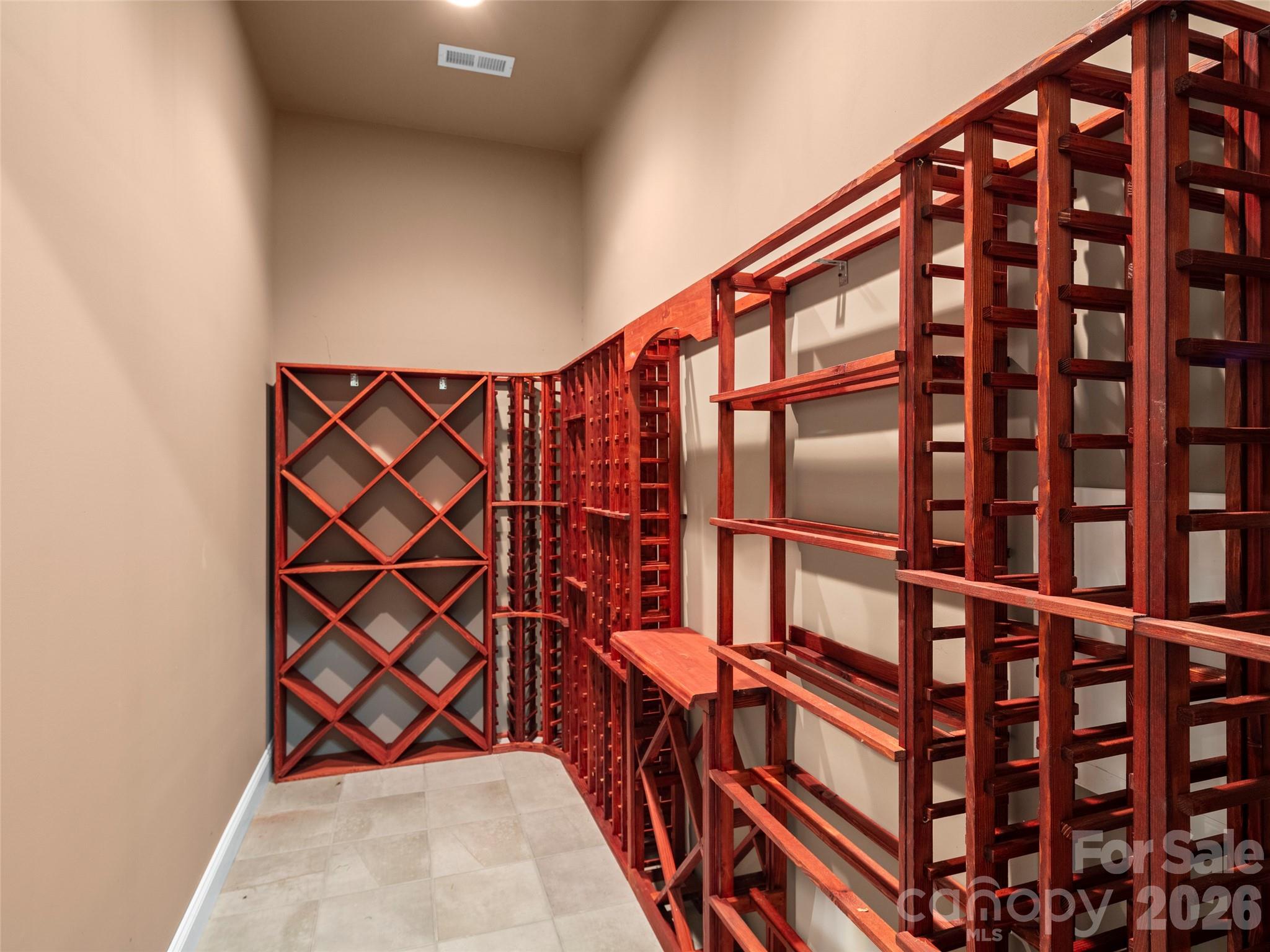 Conditioned Large-Capacity Wine Cellar on Lower Level (not shown - additional 200+/- bottle capacity wine room) - 171 Walnut Valley Parkway, Arden