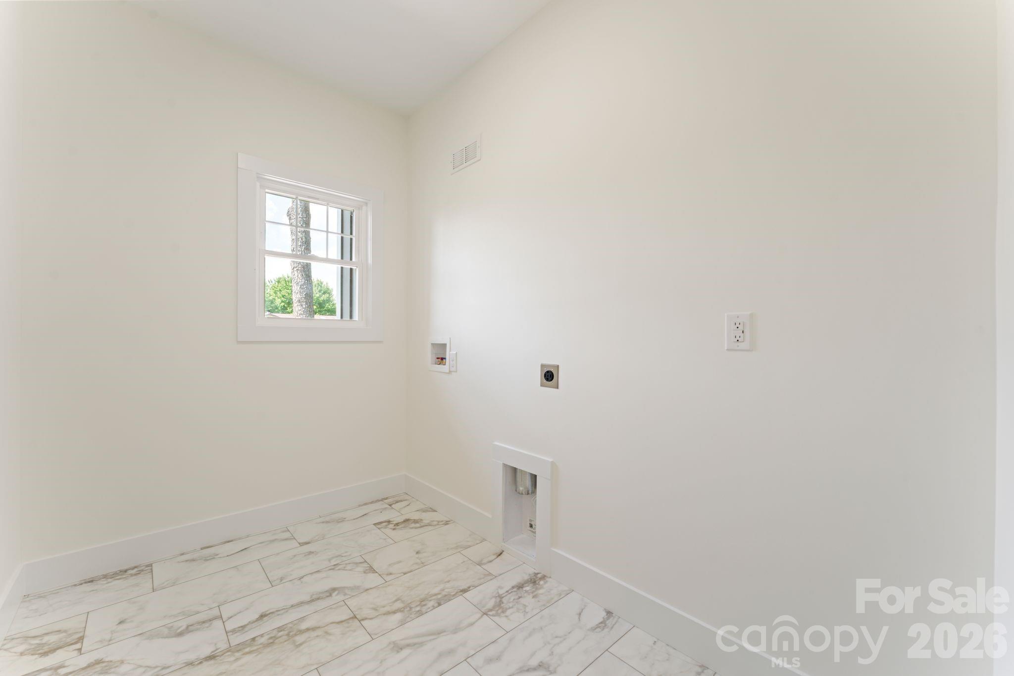 main level laundry room - 11932 Crabapple Lane, Huntersville