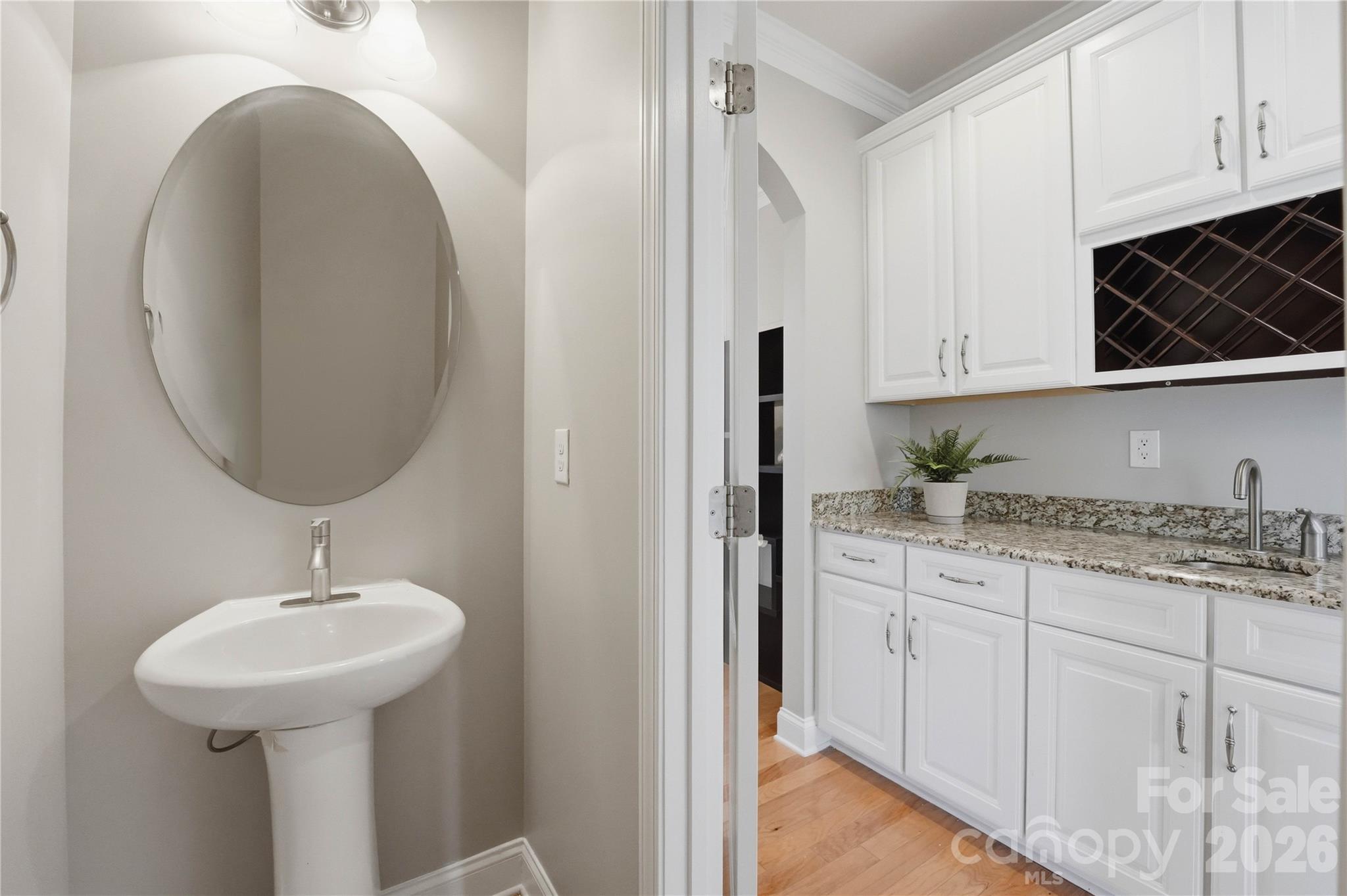 powder room on main floor - 5068 Gladiola Way, Tega Cay
