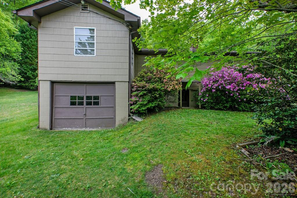 Side Yard and 1 car basement Garage - 520 Blythe Road, Pisgah Forest