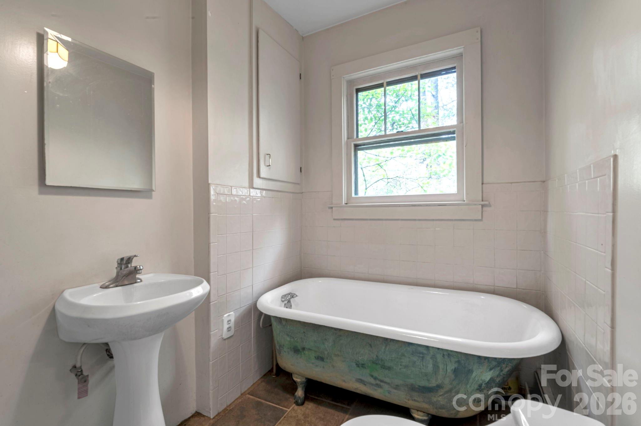 On suite bathroom between kitchen and other front bedroom - 257 Pine Street, Black Mountain