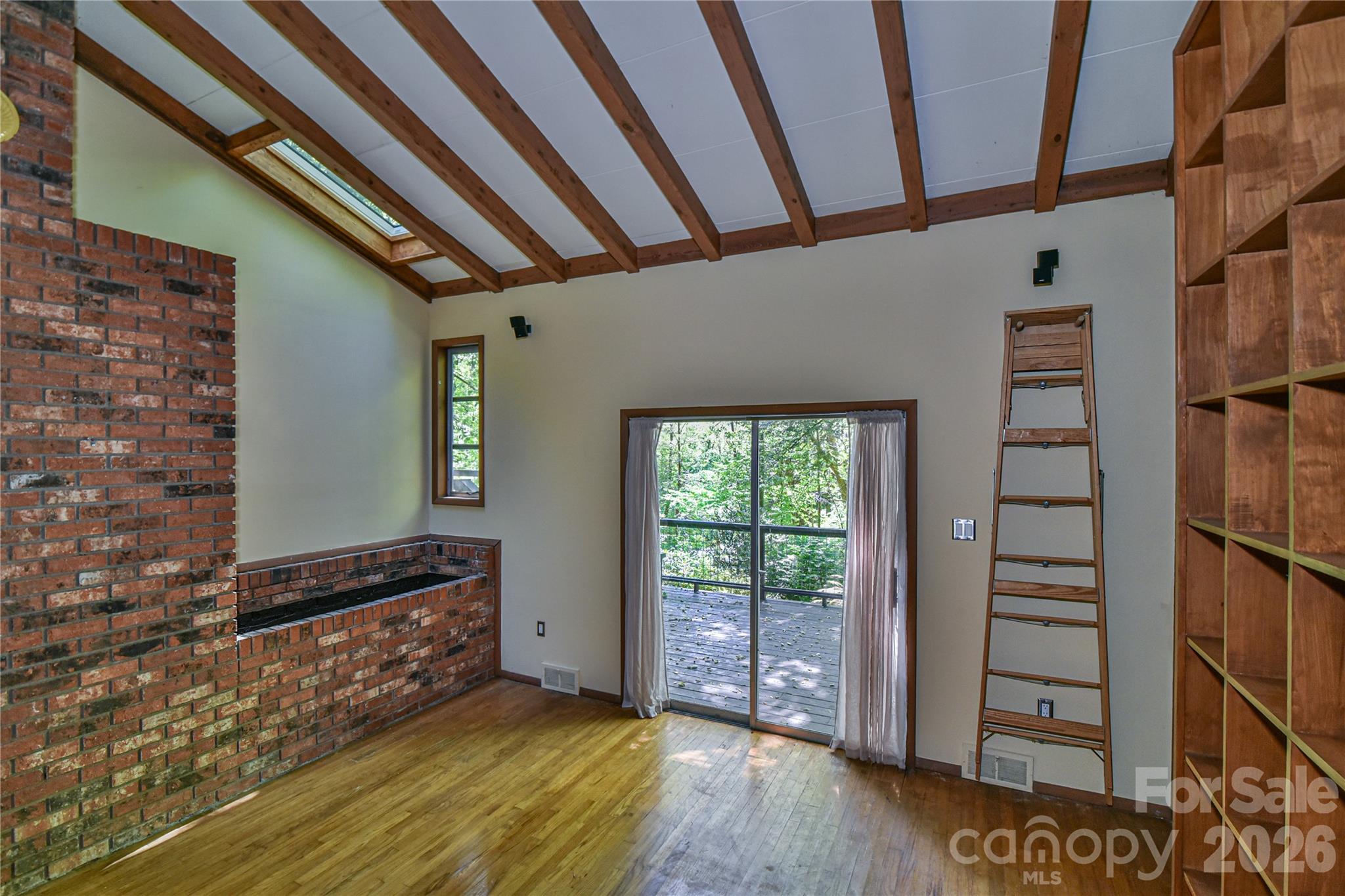 Vaulted ceilings with a suncatching skylight - 1 Hillcrest Lane, Black Mountain