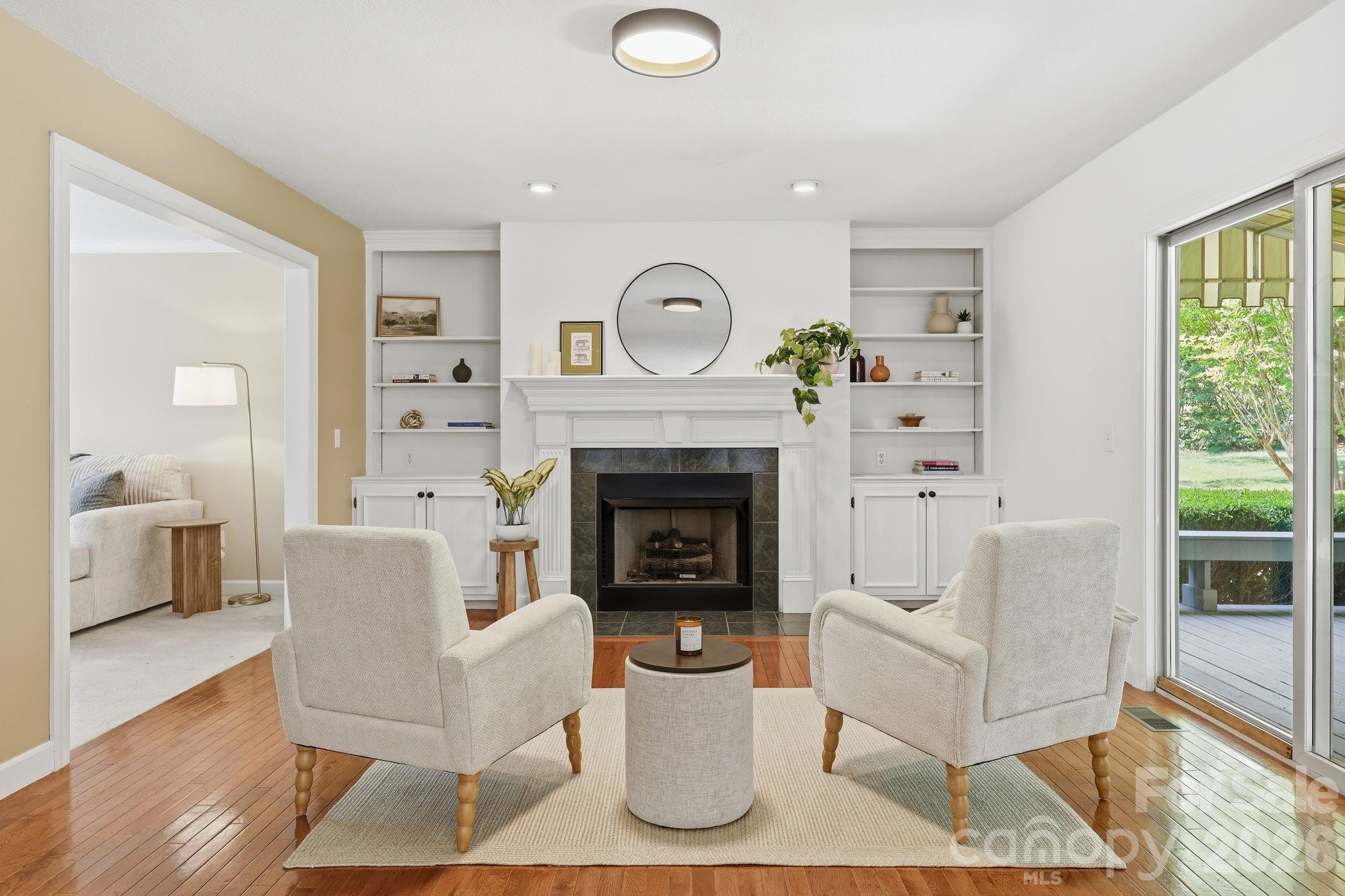 Family room with fireplace open to kitchen - 306 Woodview Court, Fletcher