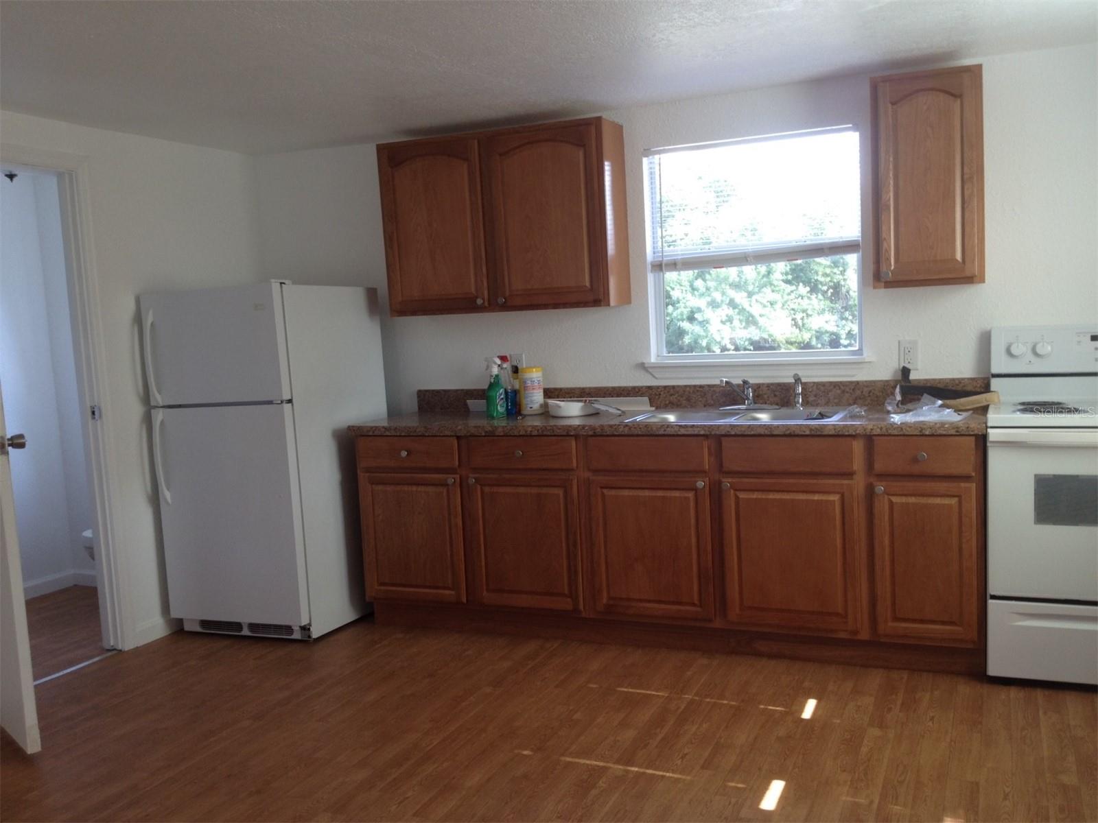 another shot of kitchen in upstairs apt - 100 ALACHUA DR, WINTER HAVEN