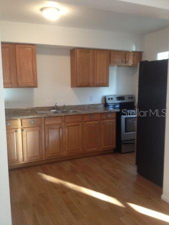 more upstairs kitchen - 100 ALACHUA DR, WINTER HAVEN
