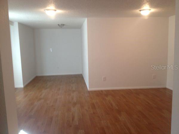 upstairs apartment living space - 100 ALACHUA DR, WINTER HAVEN